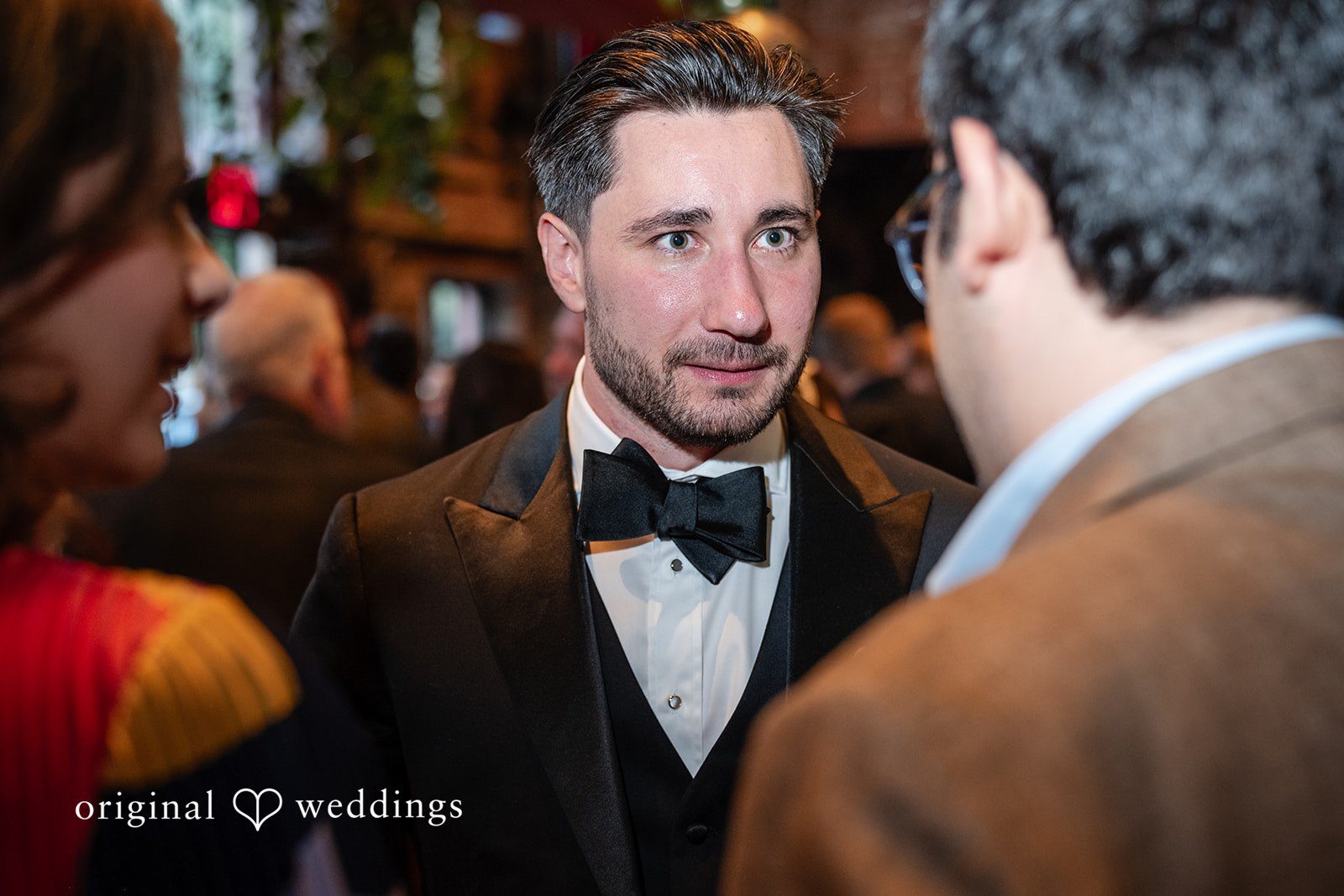 Claudio + Claire Groom greeting guests at the reception