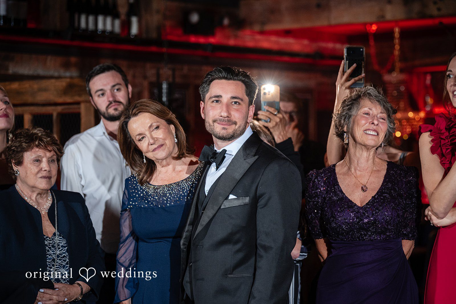 Claudio + Claire Groom with guests cheering
