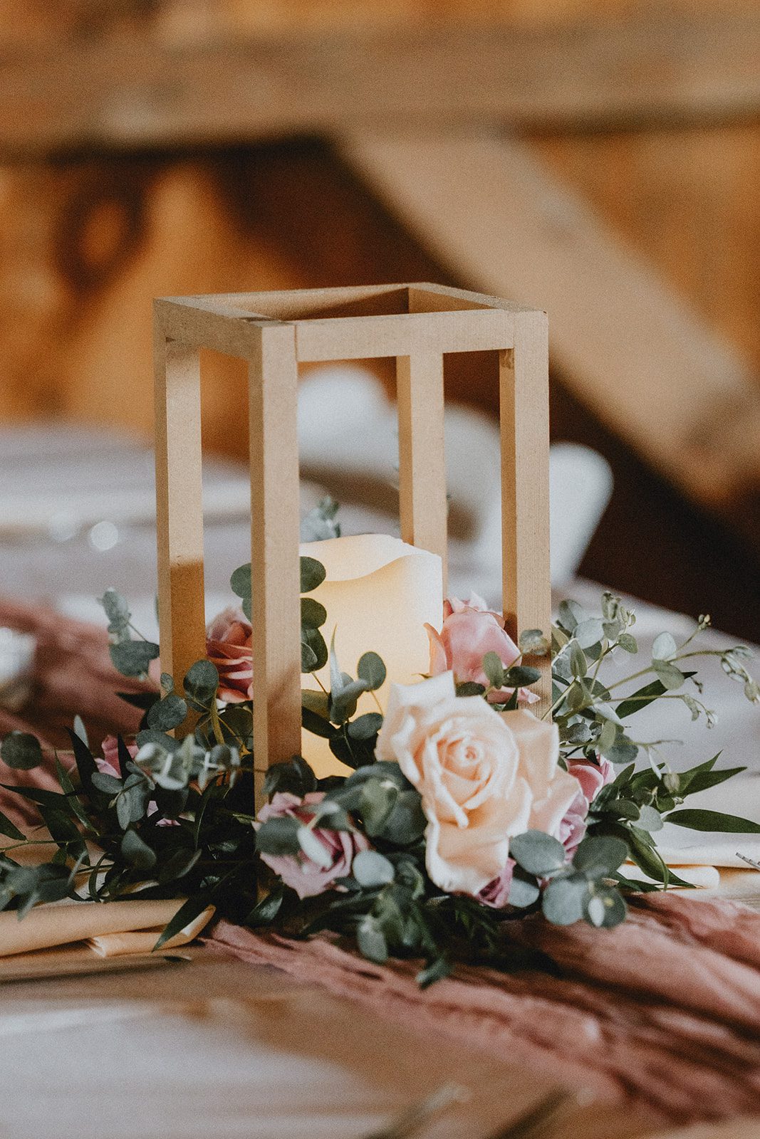 Lantern centerpiece with flowers Lantern centerpiece with flowers
