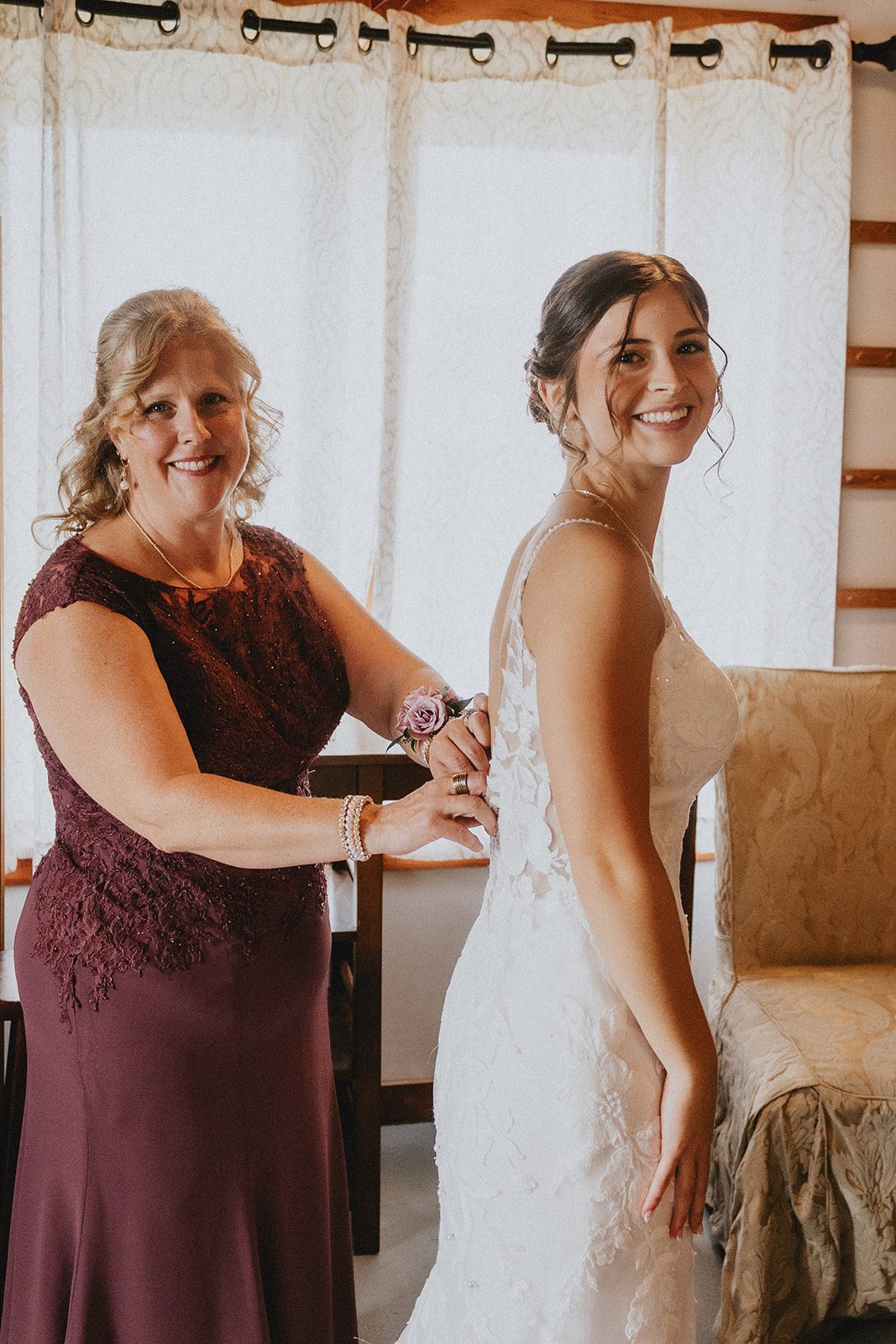Bride getting ready with her mother Bride getting ready with her mother