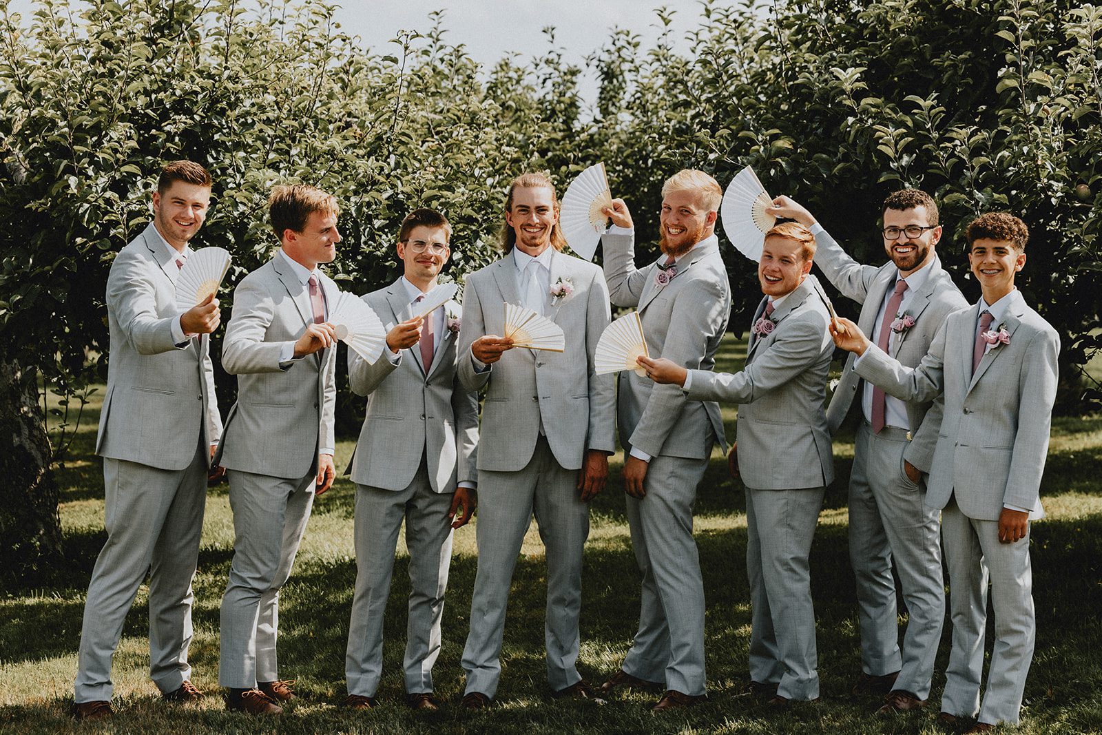 Groomsmen celebrating together Groomsmen celebrating together
