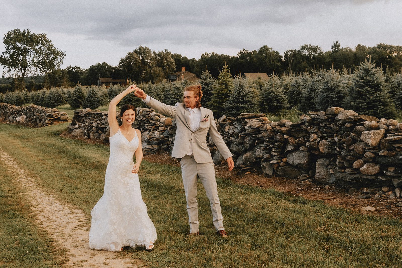 Bride and groom dancing in the field Bride and groom dancing in the field