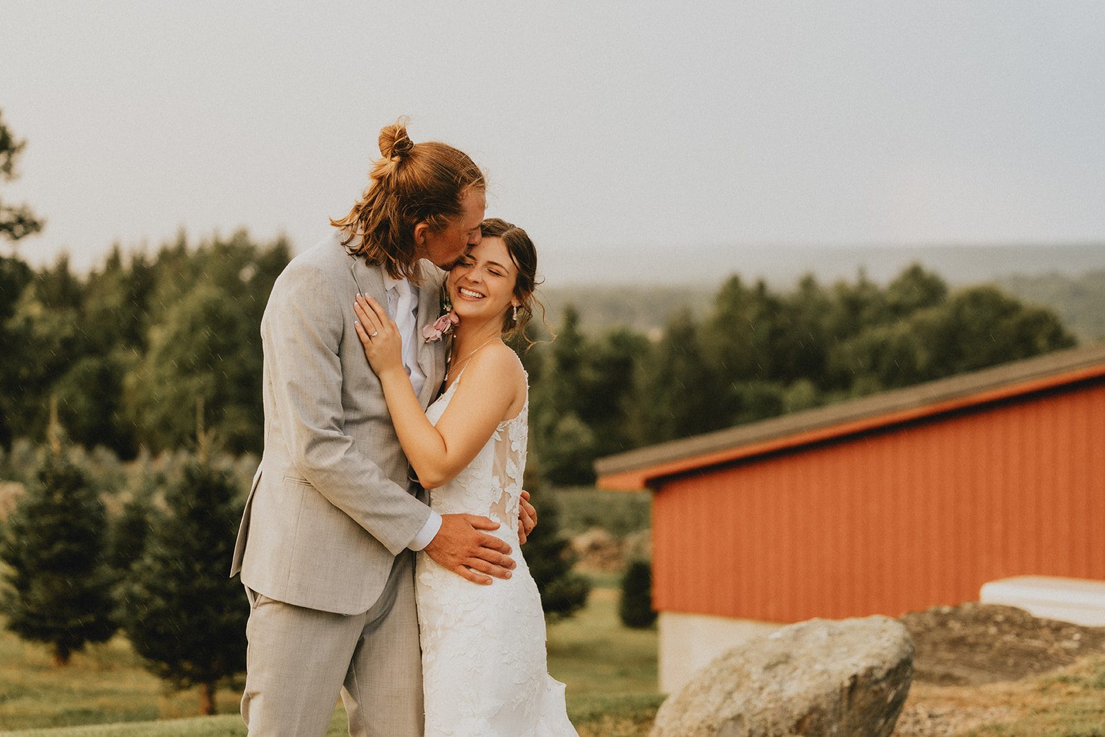 Bride and groom smiling in front of the red barn, captured by Hartford wedding photographers from Original Weddings at Allen Hill Farm Bride and groom smiling in front of the red barn, captured by Hartford wedding photographers from Original Weddings at Allen Hill Farm