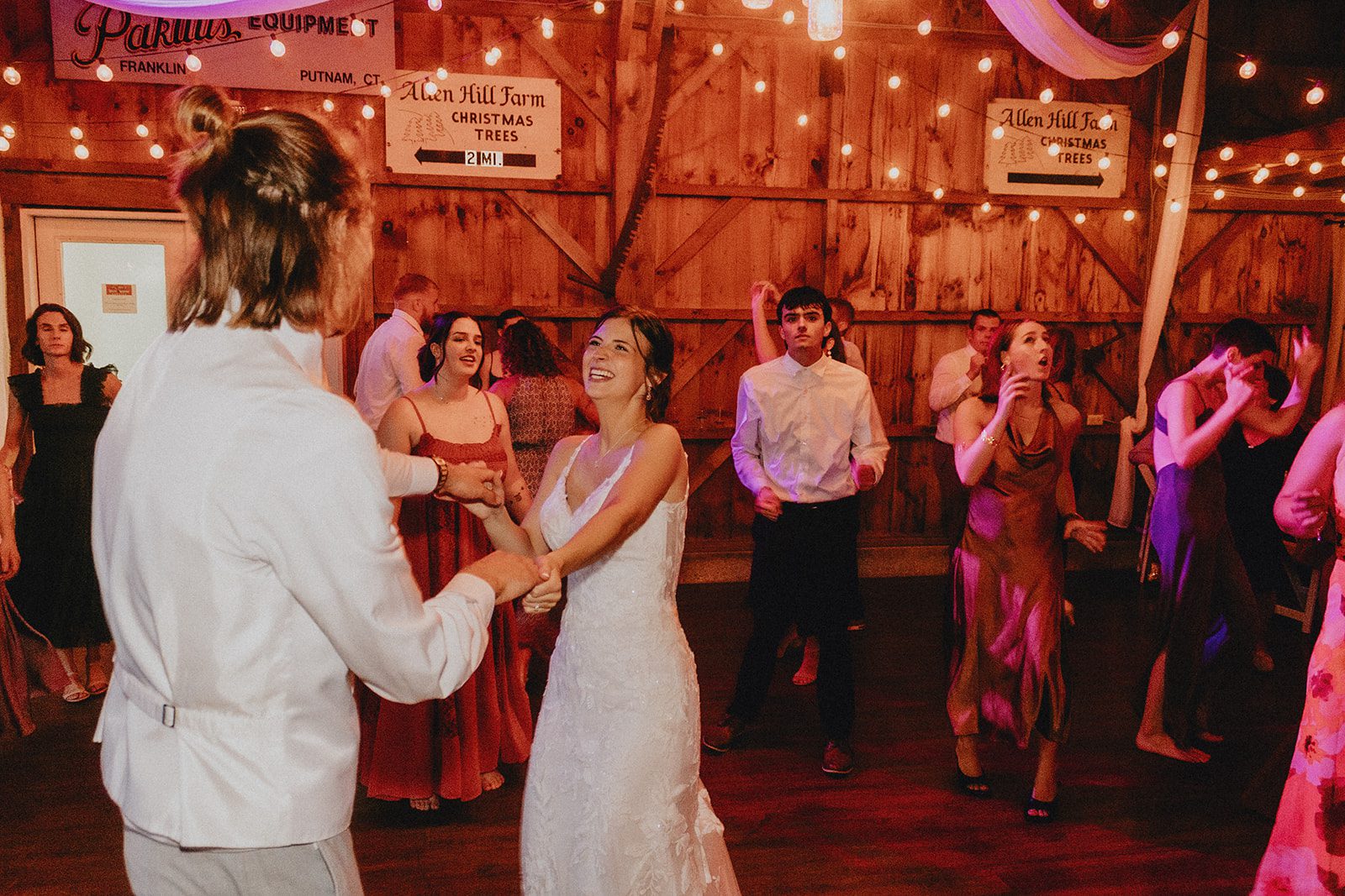 Couple dancing under the string lights Couple dancing under the string lights