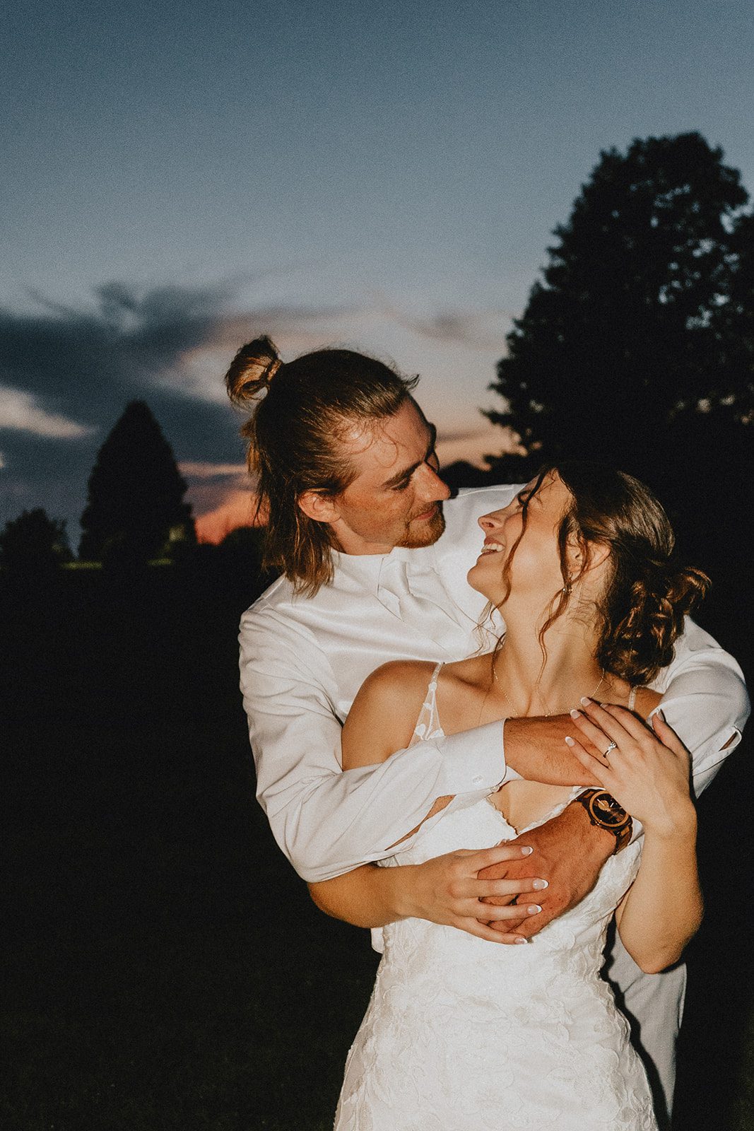 Couple celebrating with guests, captured by Hartford wedding photographers Couple celebrating with guests, captured by Hartford wedding photographers