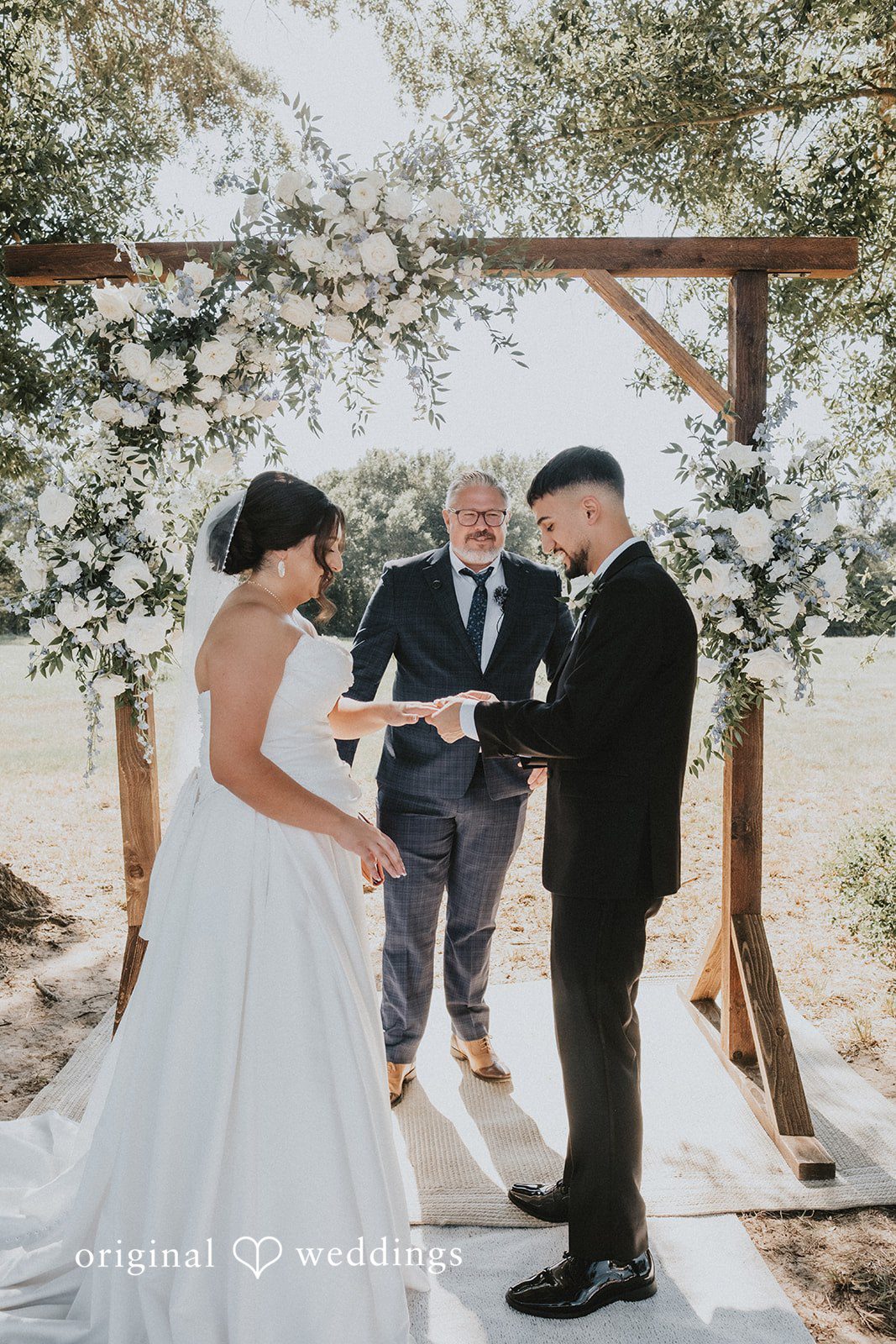 Briana + Joshua Couple exchanging vows