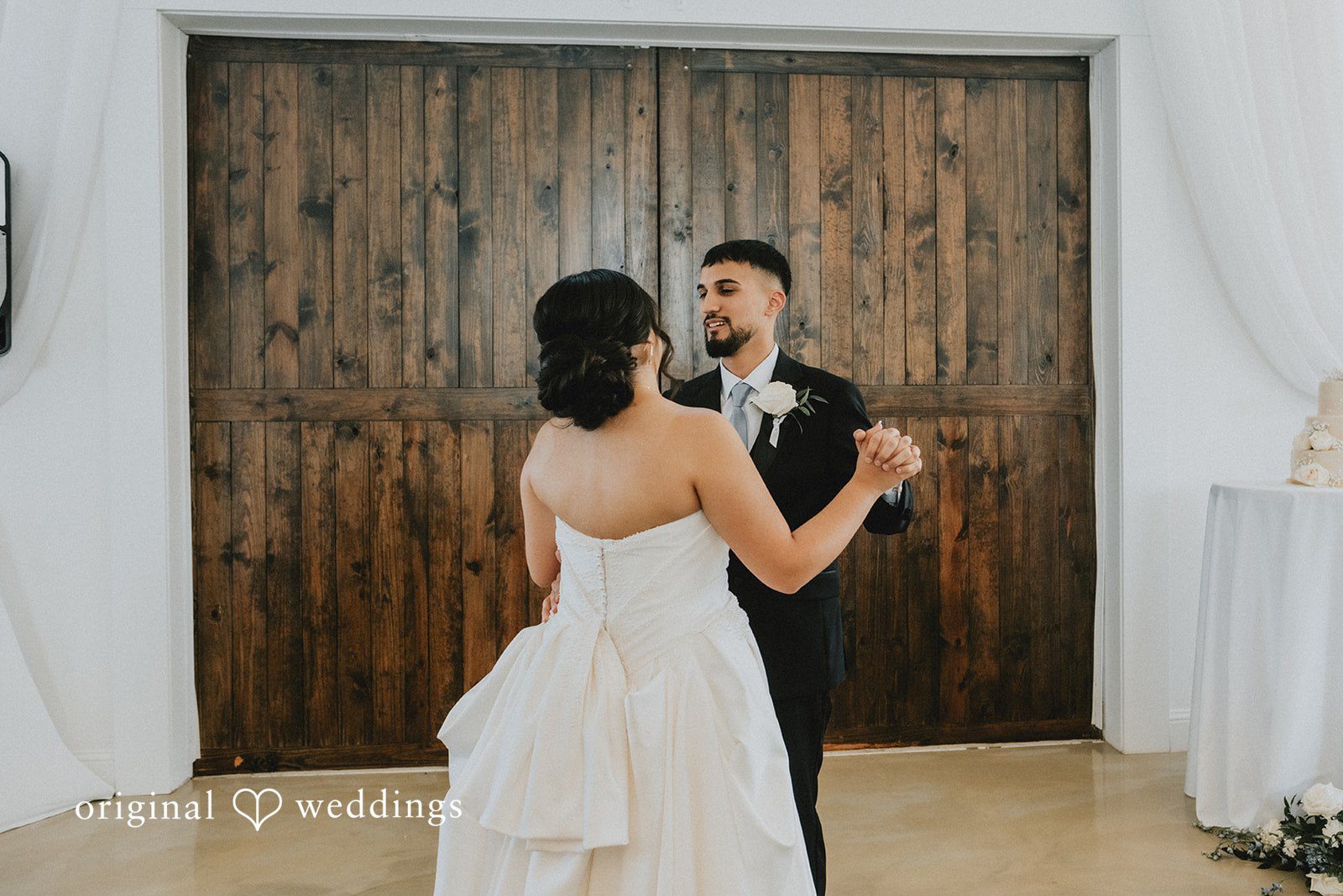 Briana + Joshua Couple dancing indoors