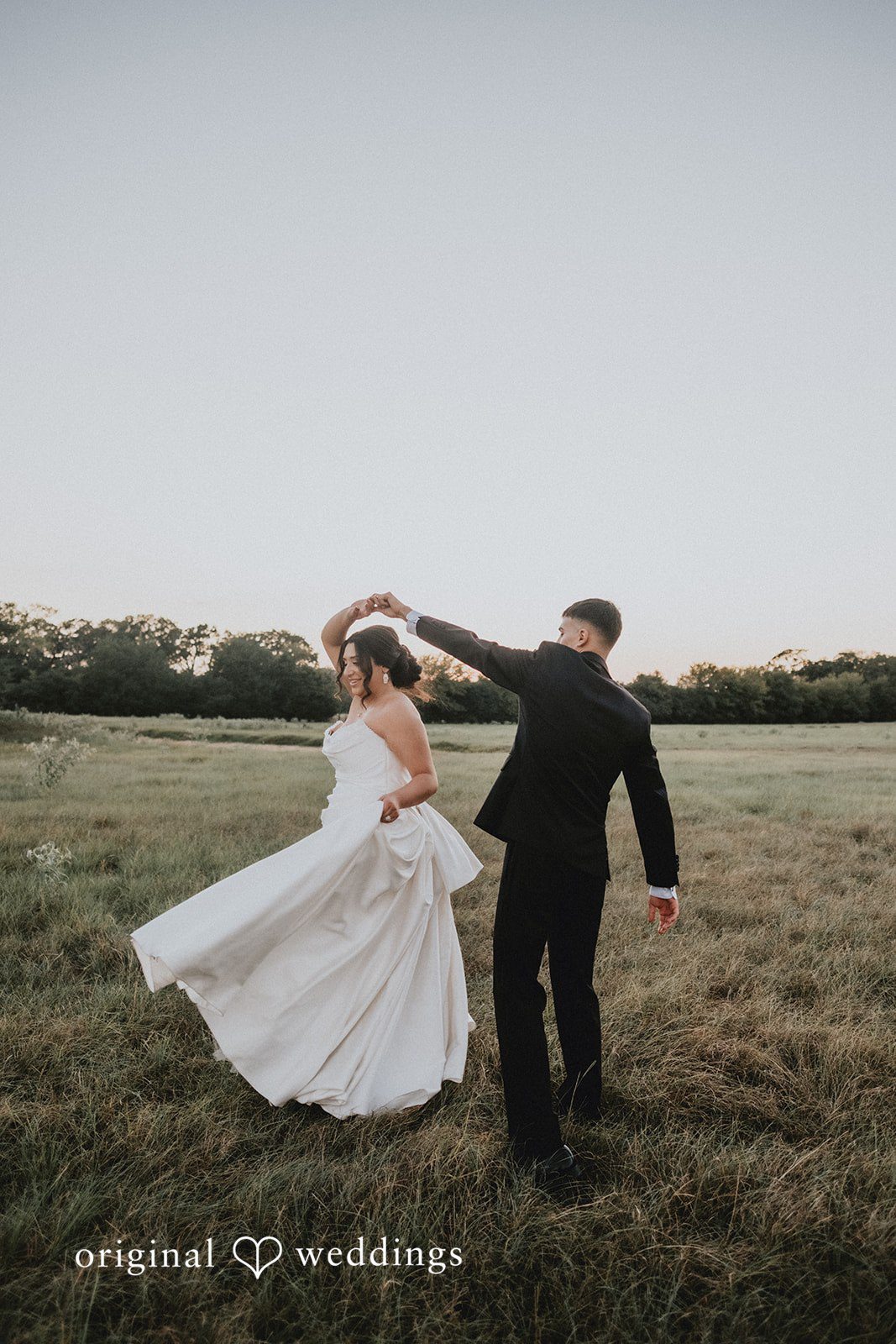 Briana + Joshua Groom spinning the bride at Always Timeless Barn