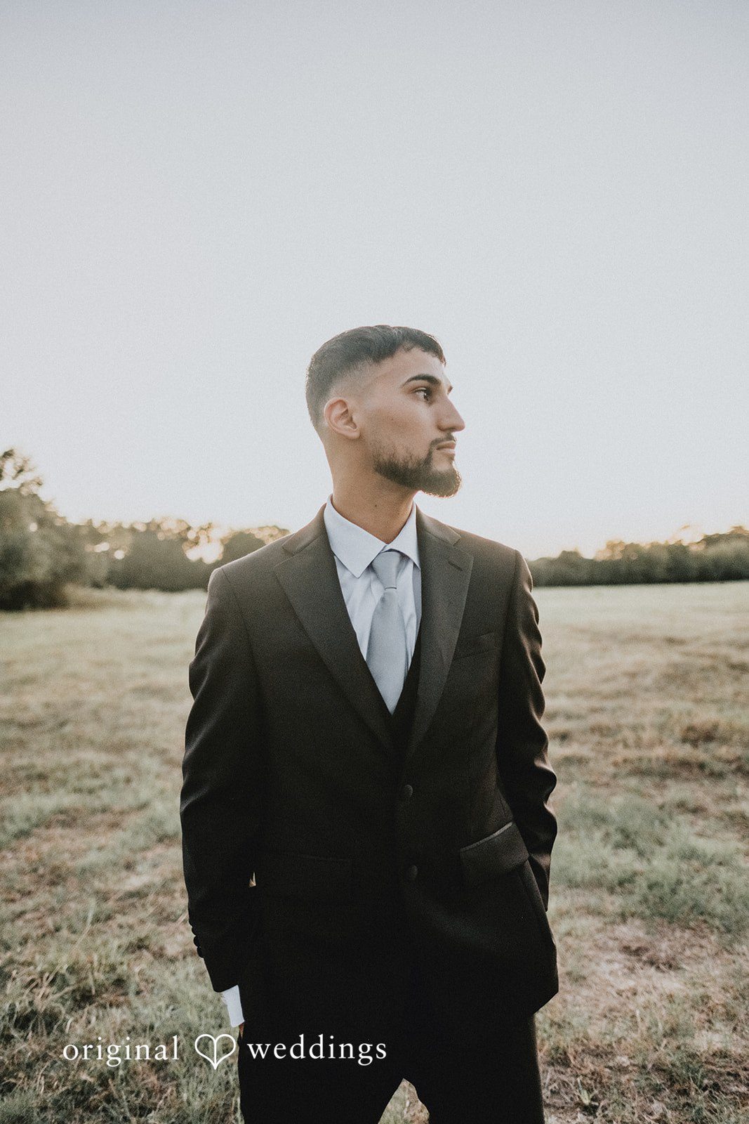 Briana + Joshua Groom in the field at Always Timeless Barn