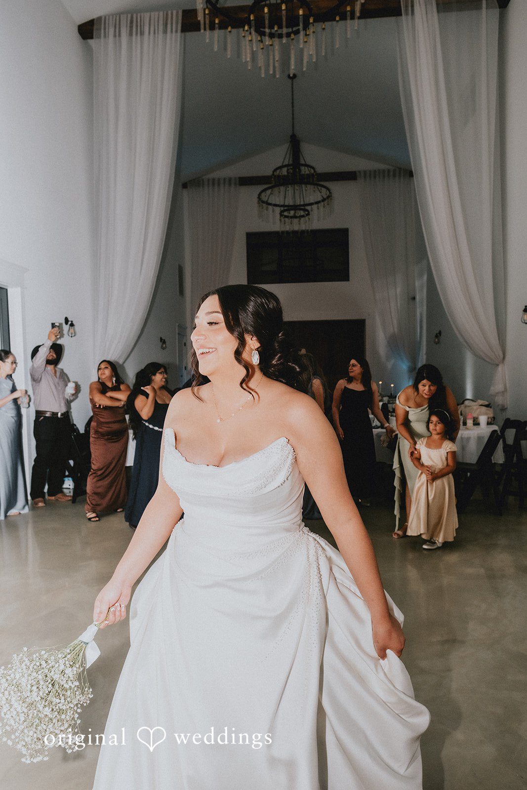 Briana + Joshua Bride entering the reception
