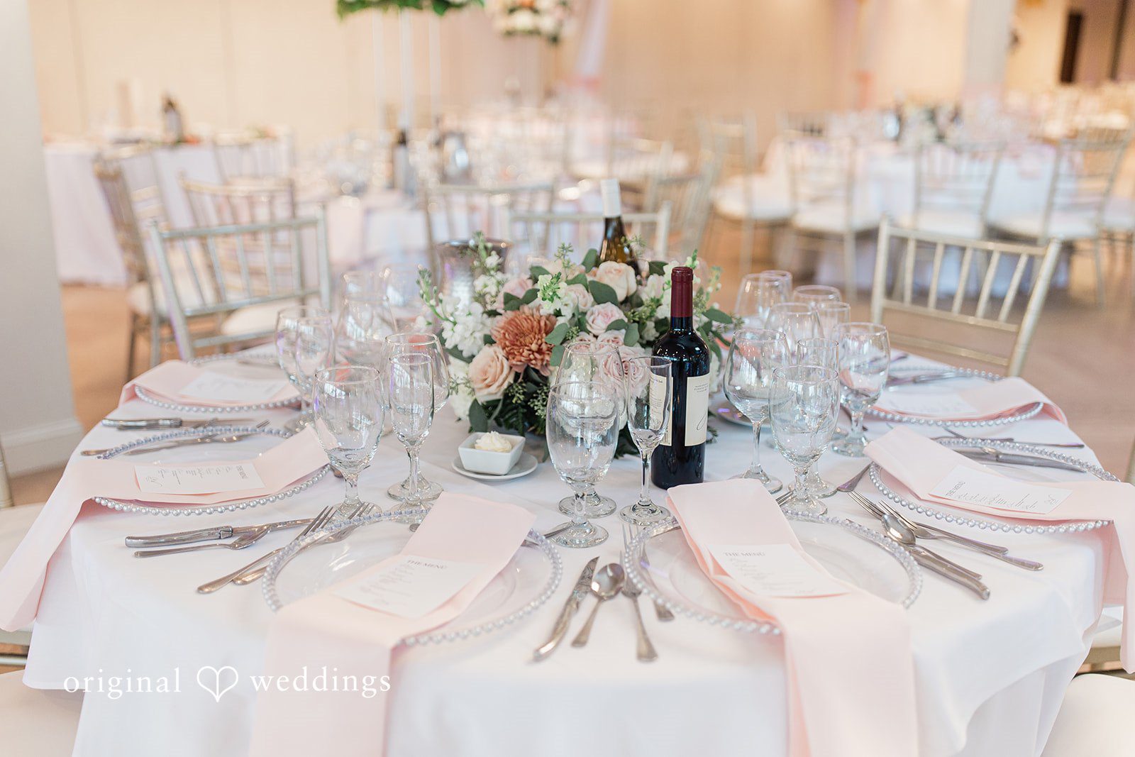 Jackie + Will Reception tables set with florals at Anthony's Ocean View