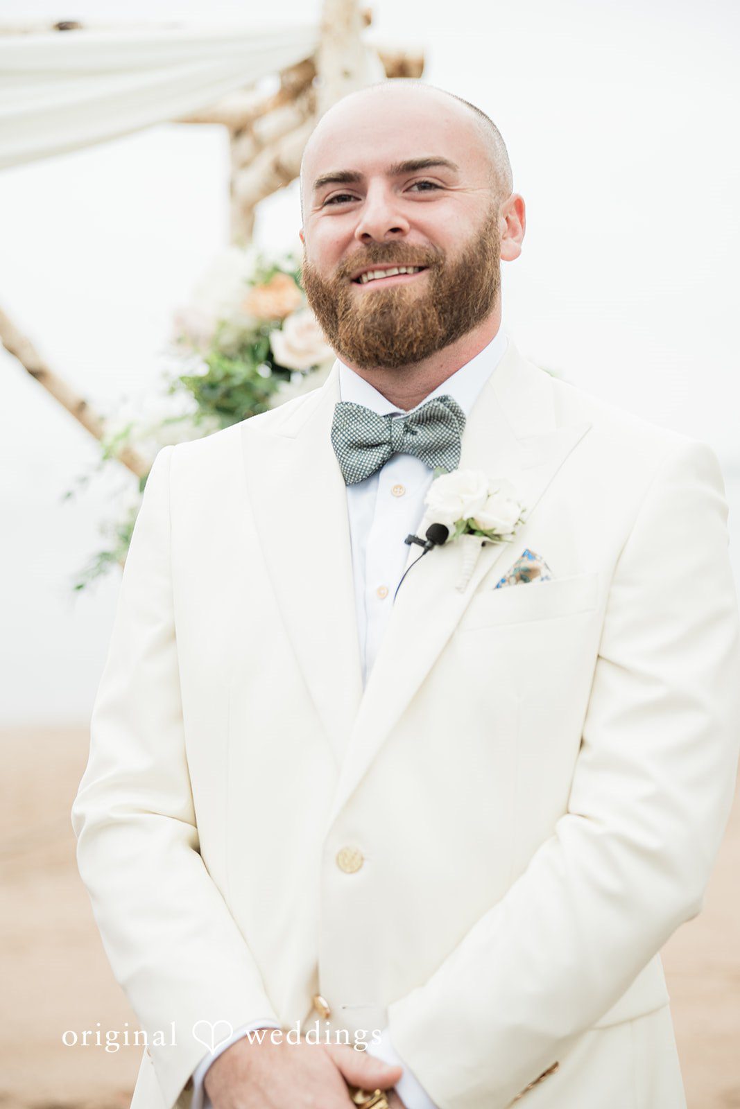 Jackie + Will Portrait of Will in his ivory suit