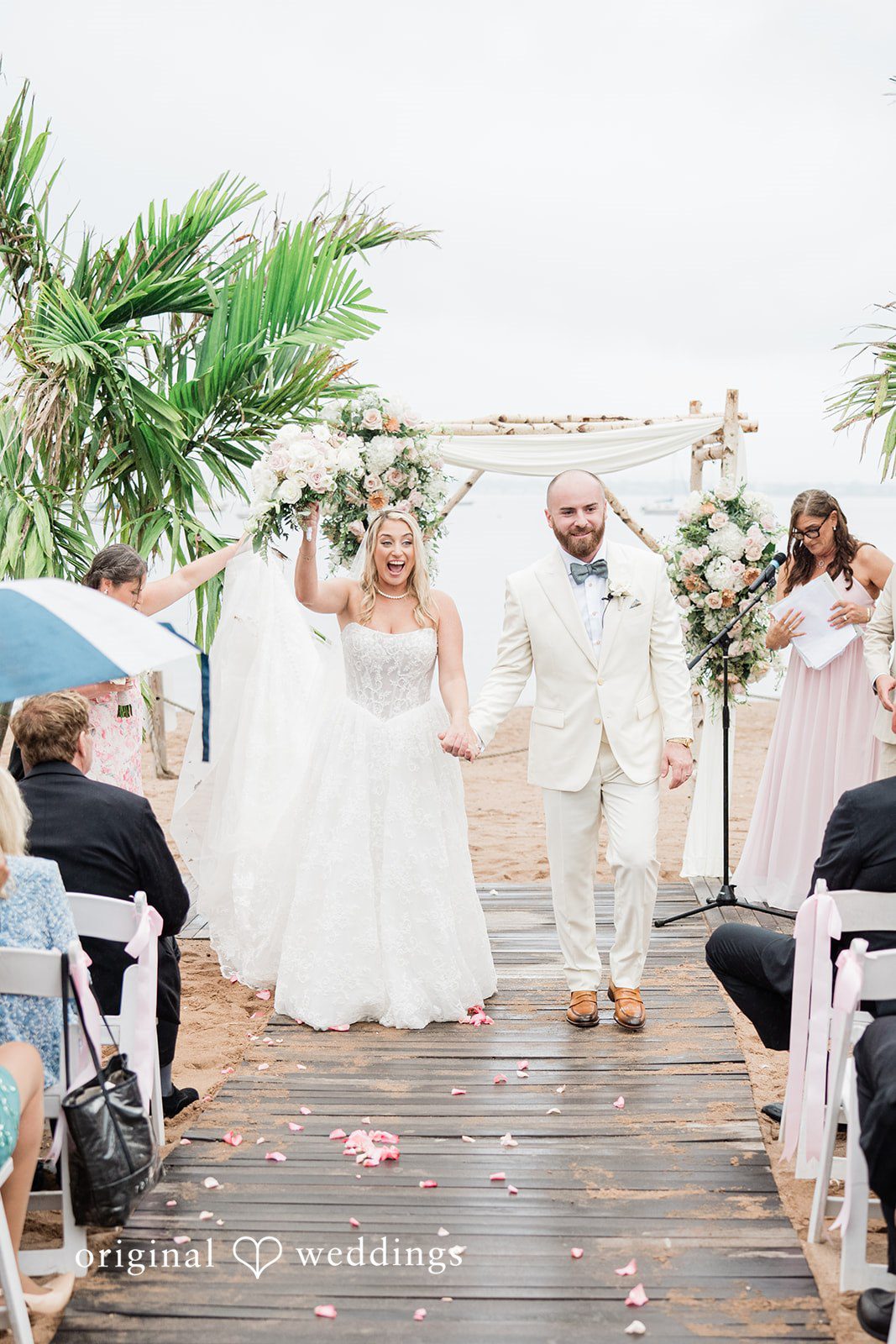 Jackie + Will Bride walking down the aisle at Anthony's Ocean View