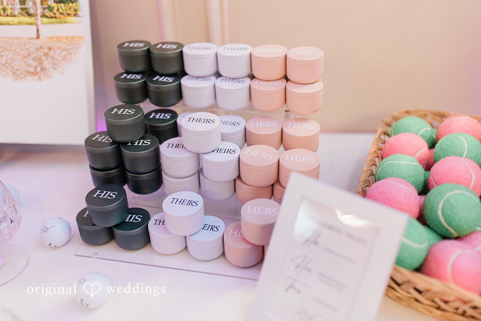 Jackie + Will Candle and macaron wedding favors on display