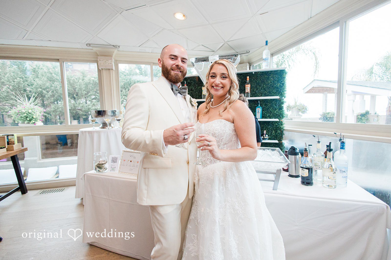 Jackie + Will Jackie and Will by the bright windows, captured by New York wedding photographers from Original Weddings at Anthony's Ocean View