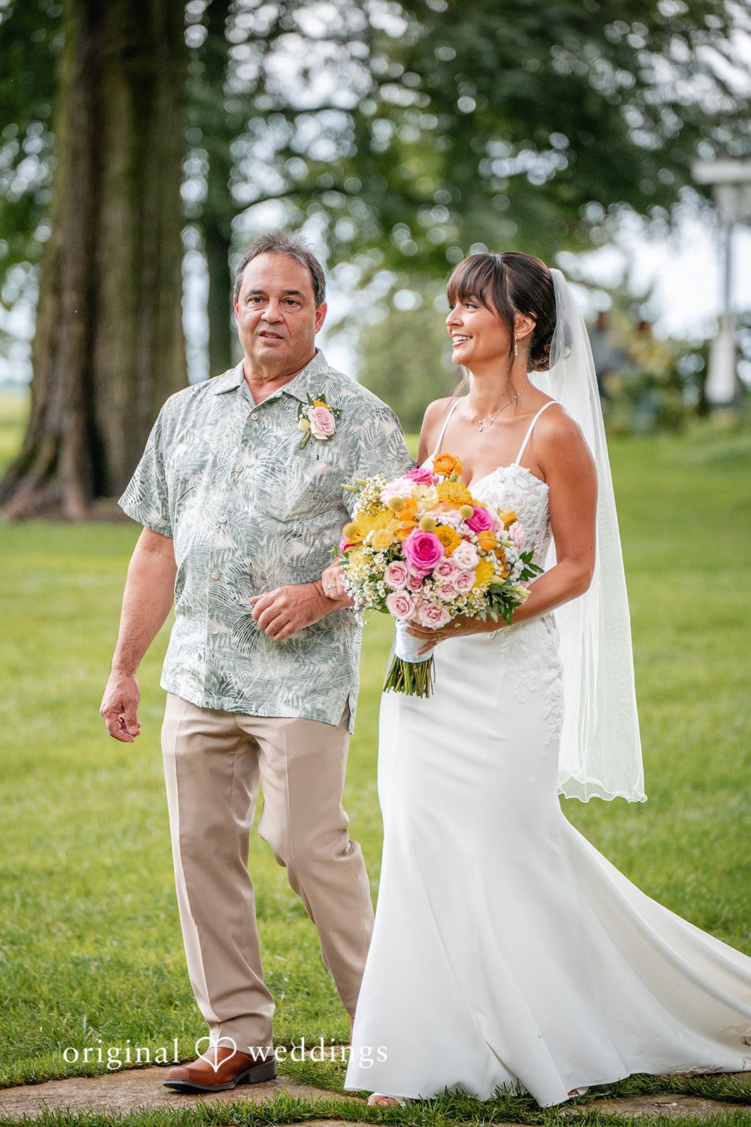 Couple walking together on the lawn