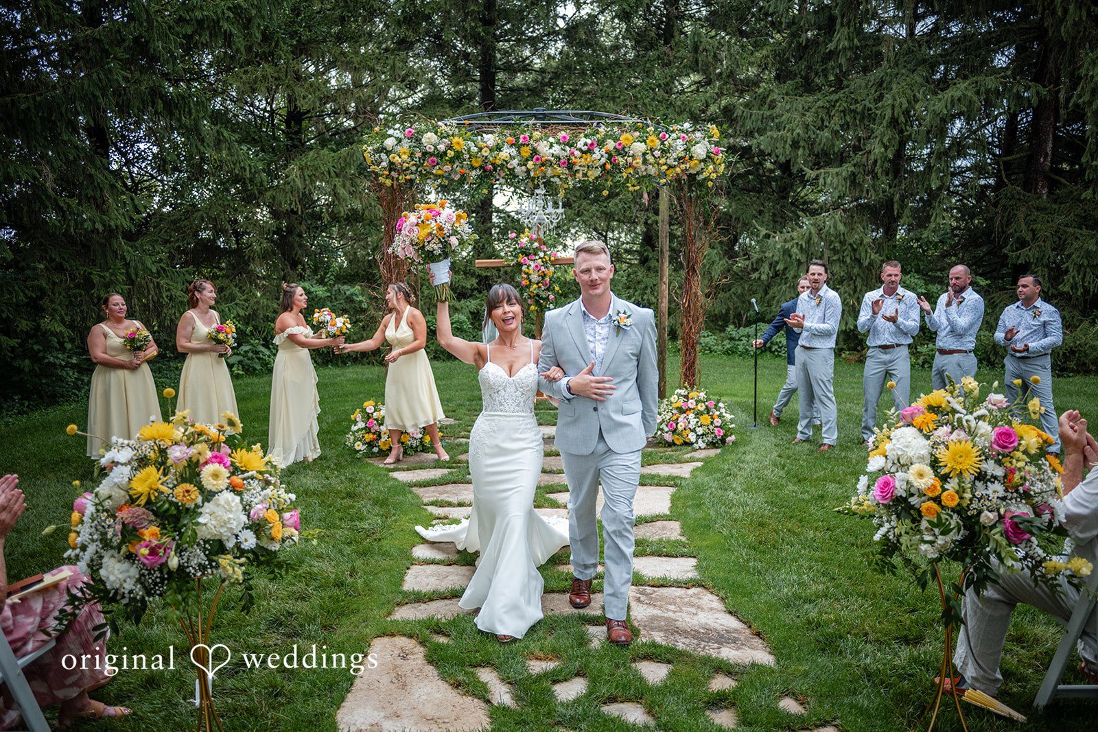 Guests watching the outdoor ceremony at Ashley Farm