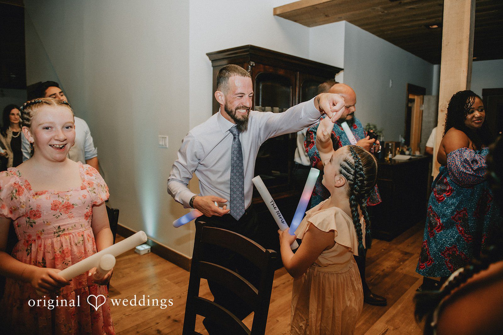 Johana + Arthur Celebrating at the reception
