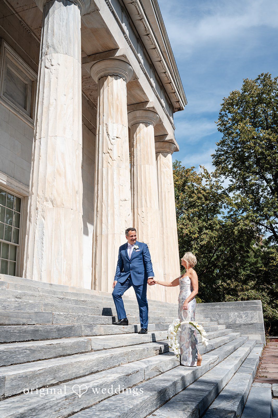 Alexandra + John Couple on grand stone steps at Barclay Prime