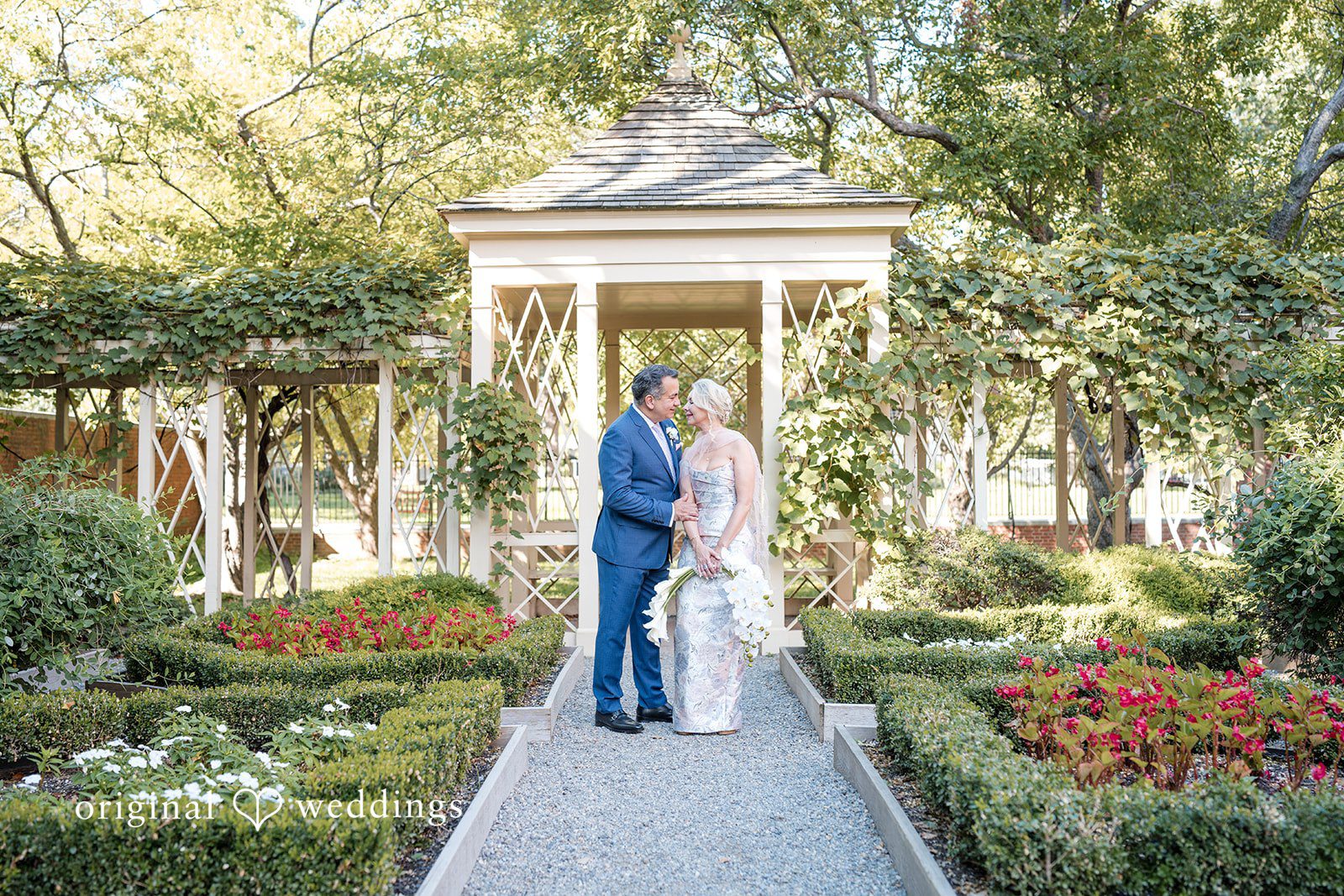 Alexandra + John Couple in a garden with a gazebo