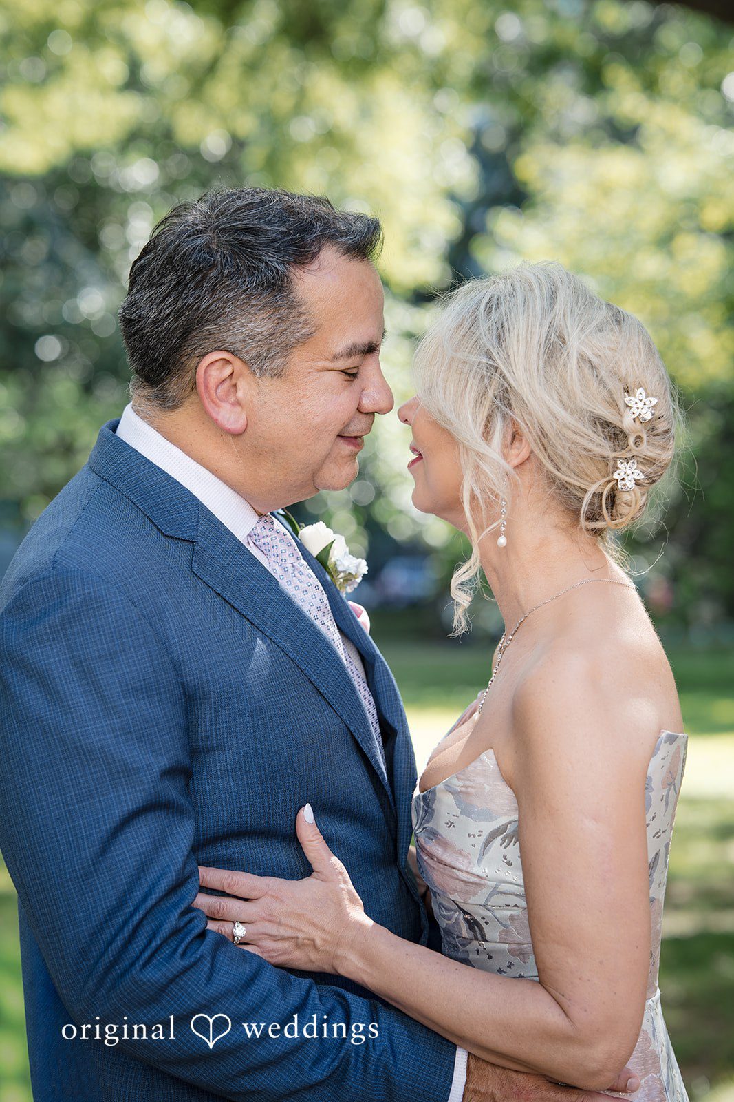 Alexandra + John Groom holding the bride close