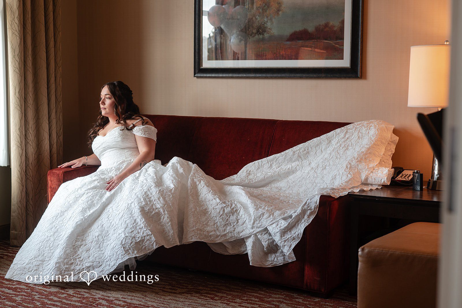 Bride relaxing in her gown before the ceremony