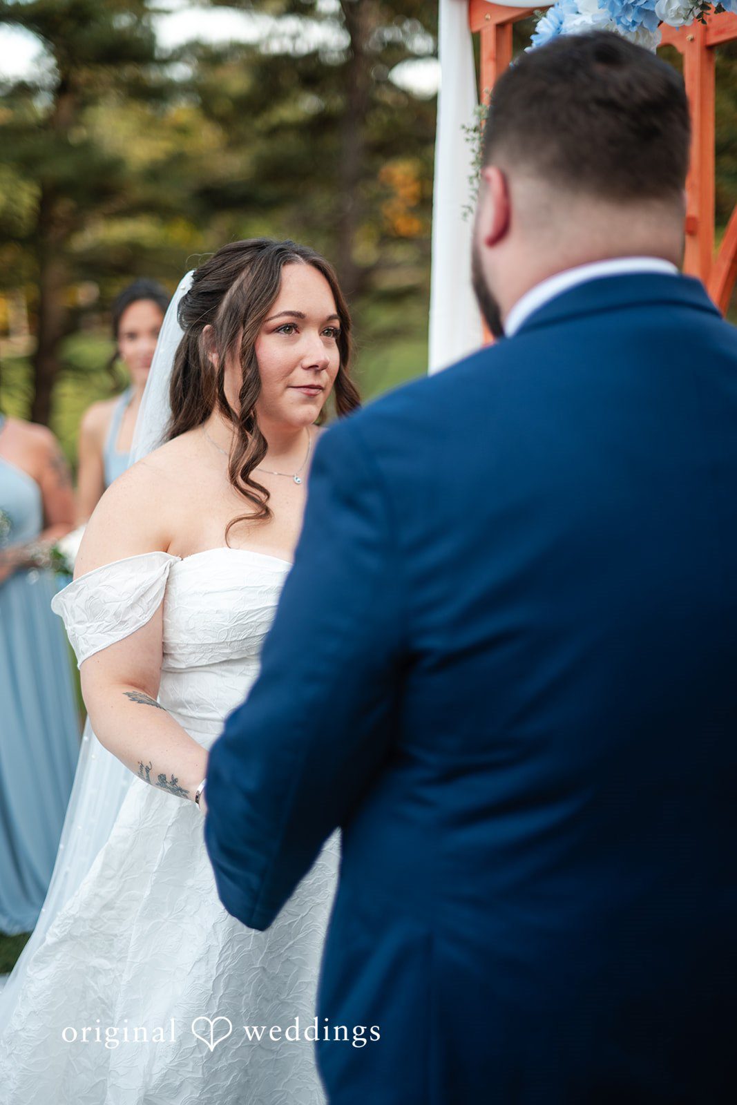 First look over the groom's shoulder
