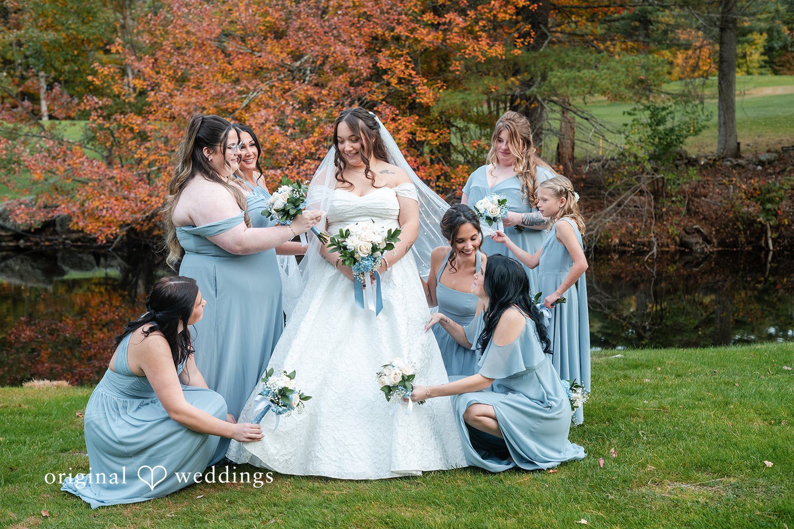 Bride with her bridesmaids in light blue at Berlin Country Club