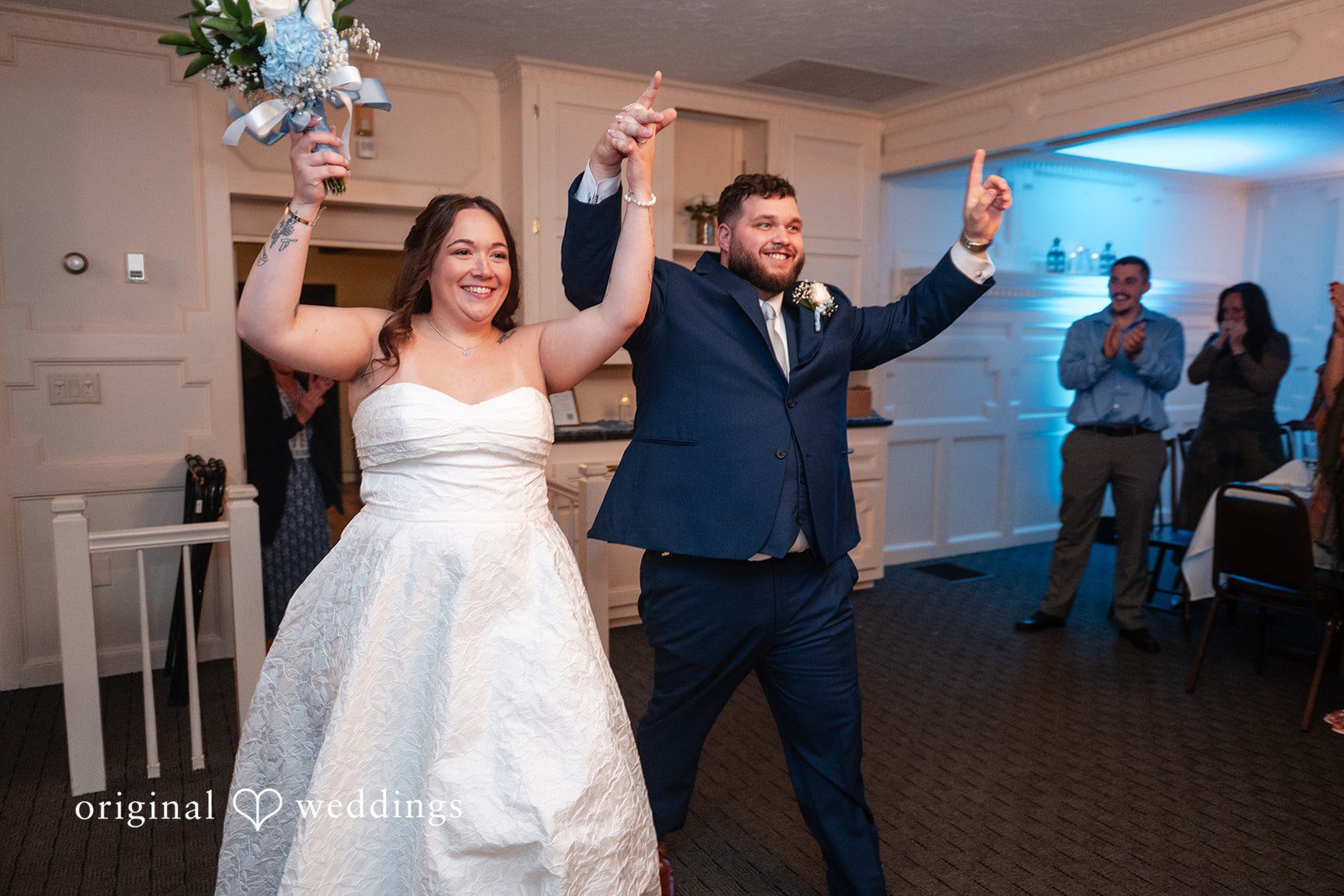 Grand entrance with arms raised at Berlin Country Club