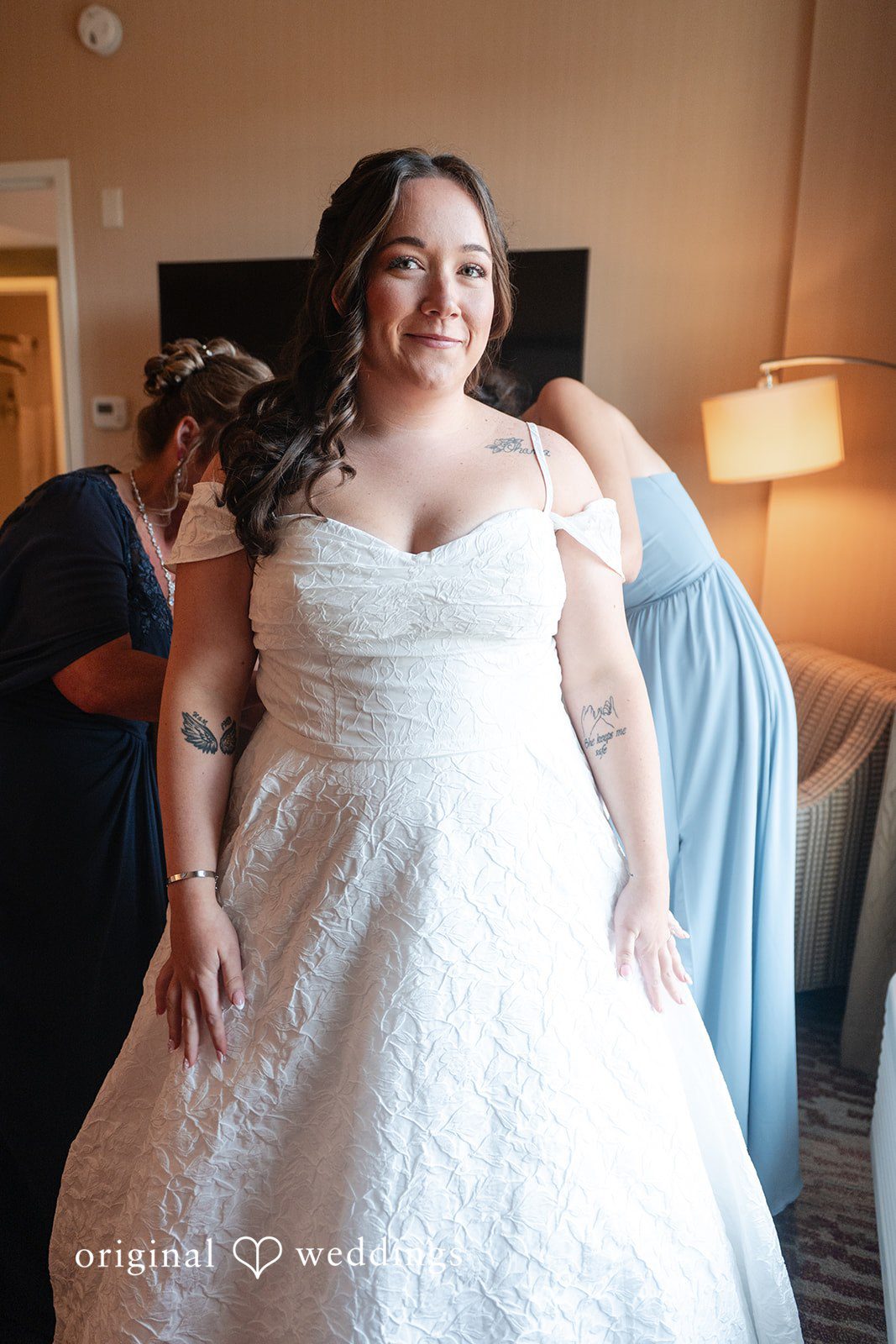 Bride getting ready with her bridesmaid at Berlin Country Club
