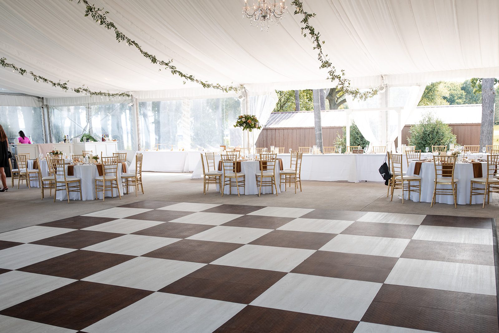bishops-bay-country-club-timeless-madison-bianca-colin-p001-02 Reception tent with a checkered dance floor at Bishops Bay Country Club