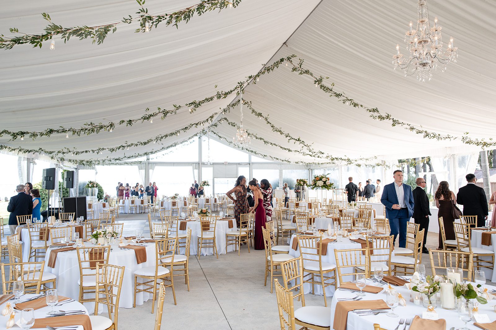 bishops-bay-country-club-timeless-madison-bianca-colin-p002-08 Tent reception tables set for guests at Bishops Bay Country Club