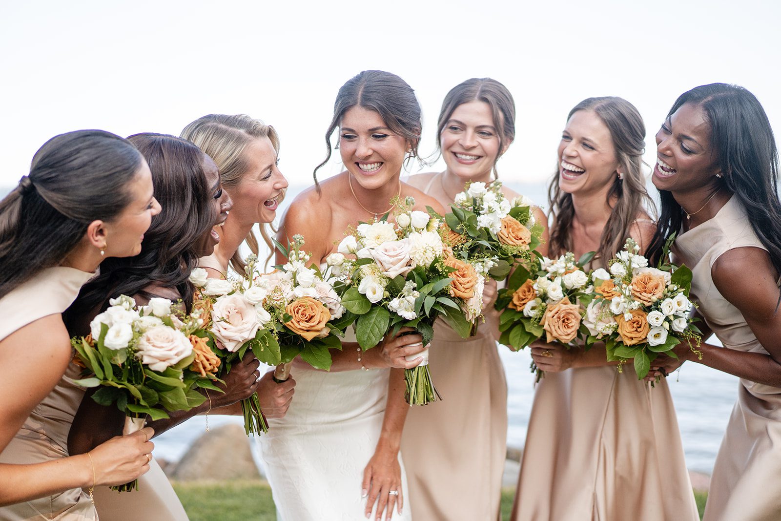 bishops-bay-country-club-timeless-madison-bianca-colin-p013-05 Bridesmaids holding their bouquets