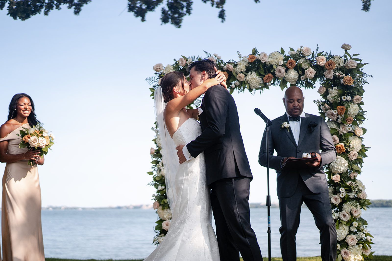 bishops-bay-country-club-timeless-madison-bianca-colin-p022-01 Ceremony under the floral arch at Bishops Bay Country Club