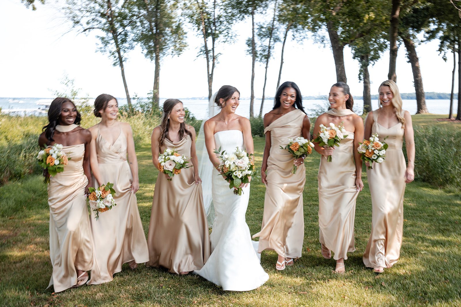 bishops-bay-country-club-timeless-madison-bianca-colin-p041-04 Bride with her bridesmaids at Bishops Bay Country Club