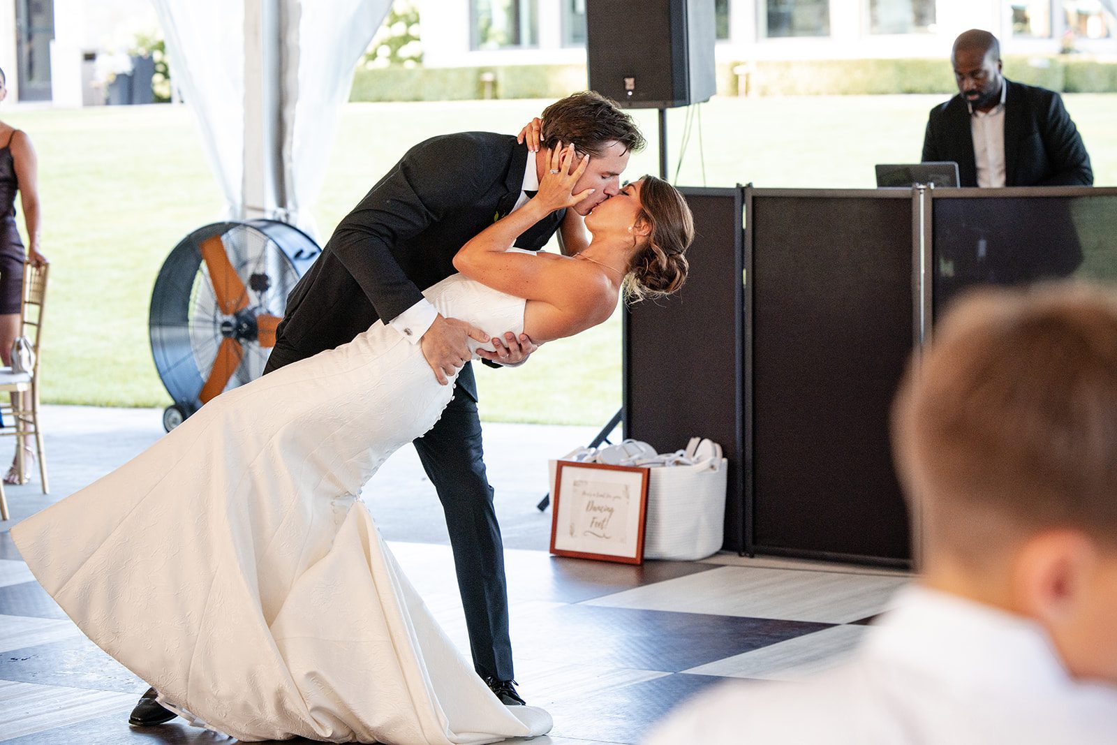 bishops-bay-country-club-timeless-madison-bianca-colin-p044-01 Groom dipping the bride during the entrance