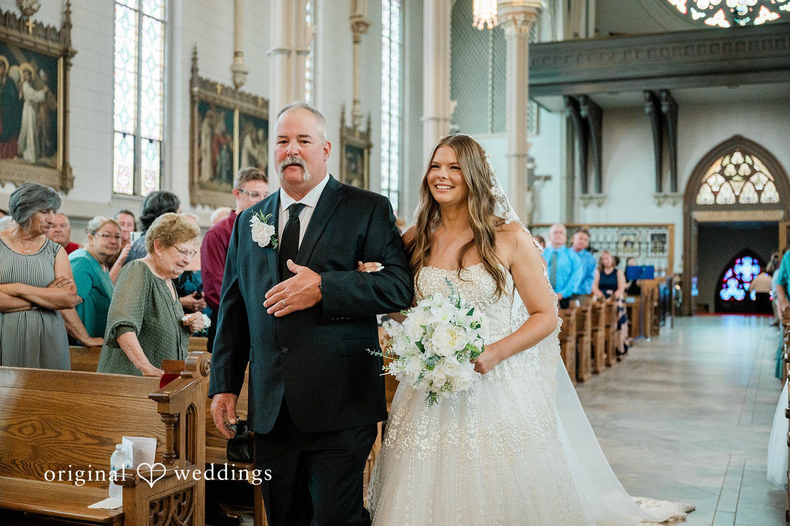 The bride walks down the aisle