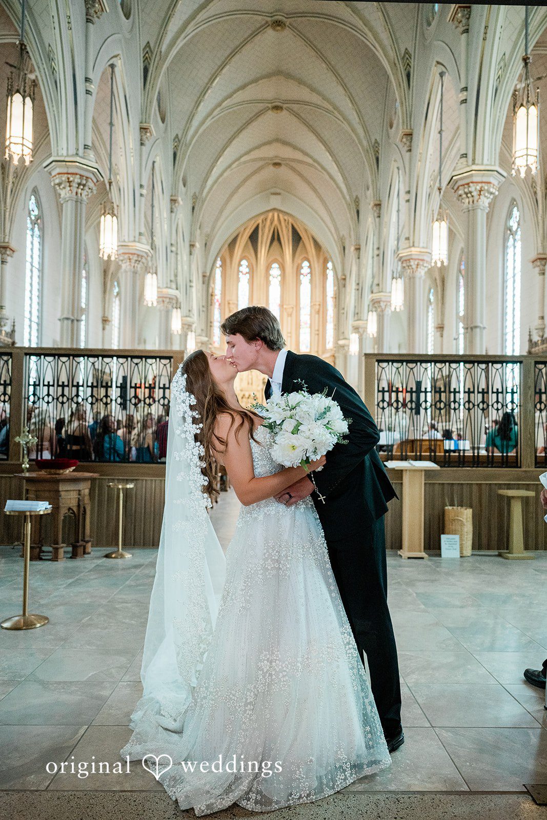 The couple shares a kiss