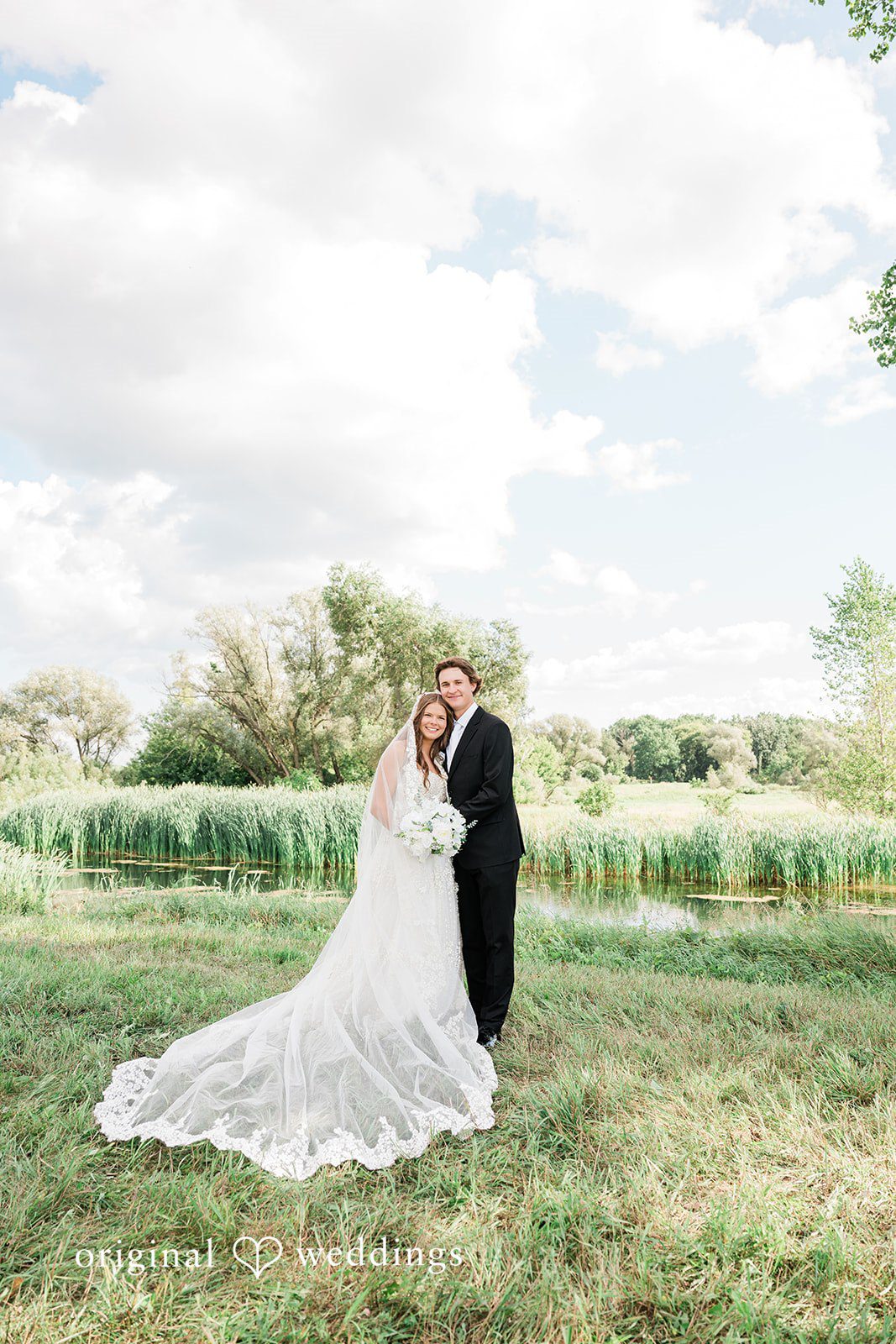 A stunning portrait of the couple outdoors