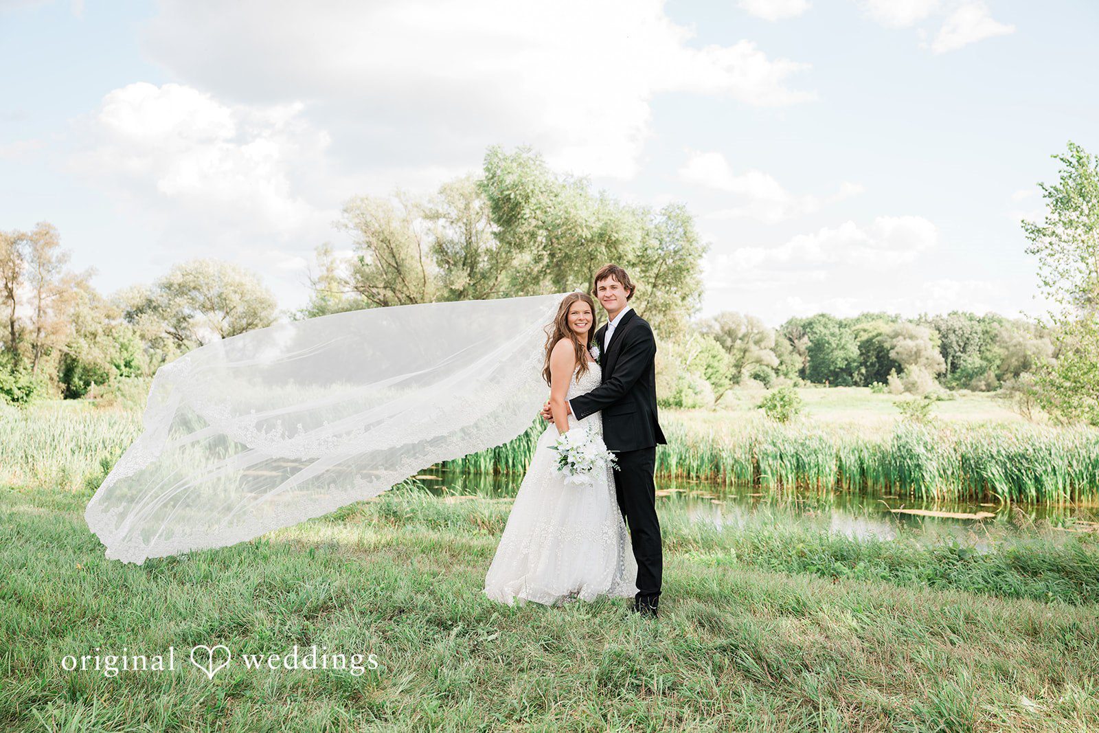 Our Milwaukee wedding photographers at Original Weddings captured a stunning portrait of the couple outdoors at the Blossom and Hops