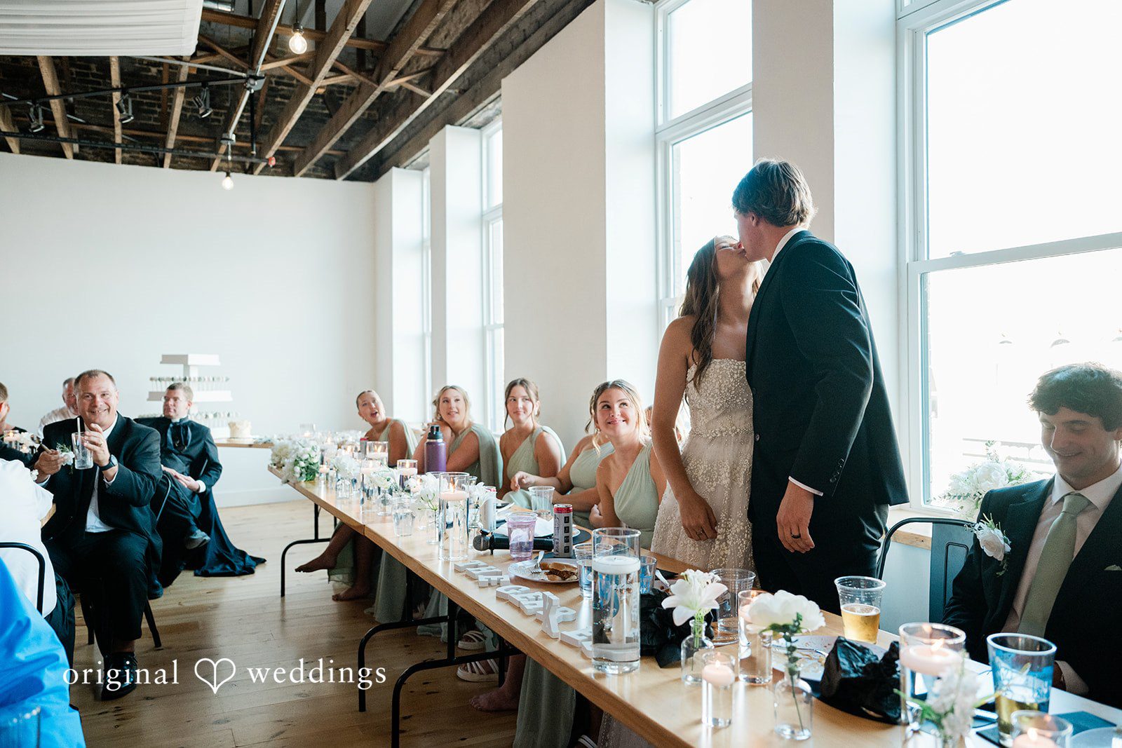 The couple shares a romantic kiss