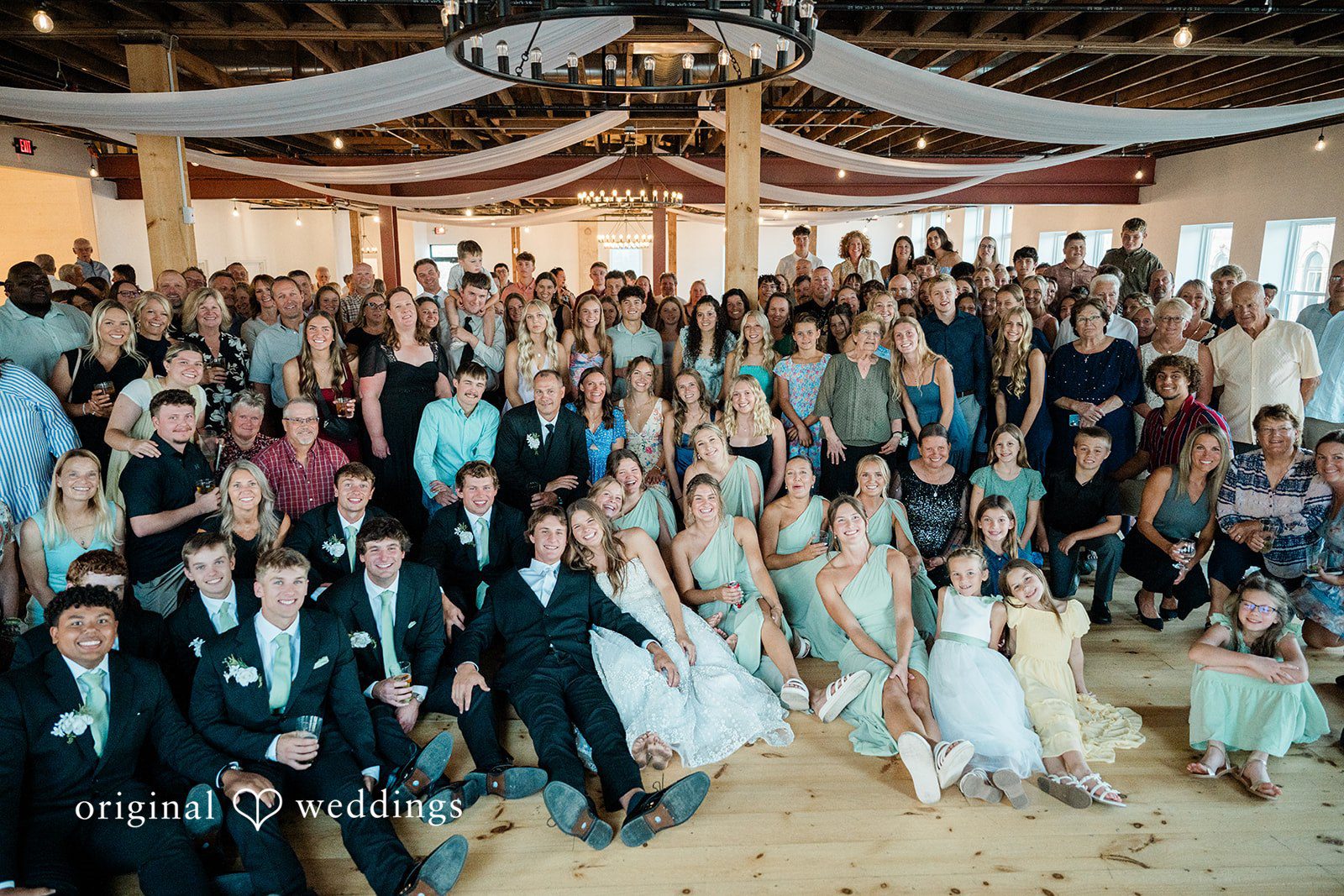 A beautiful portrait of the couple and their wedding party