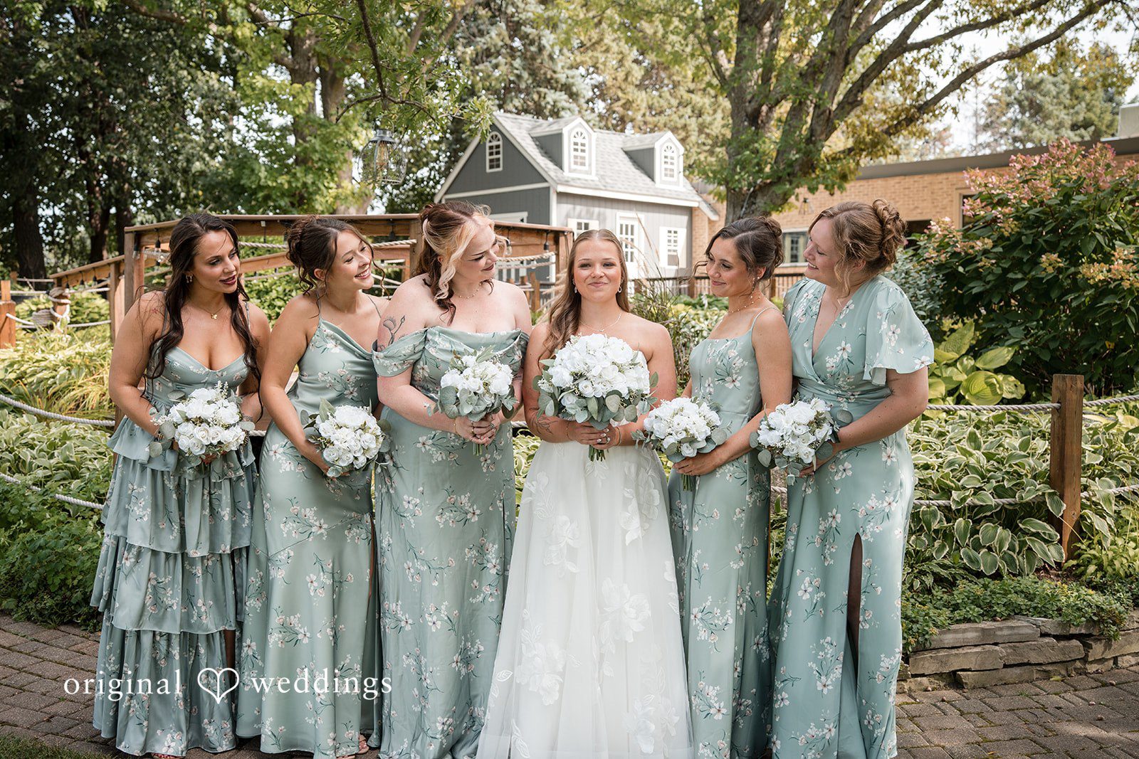 Bridesmaids in sage dresses