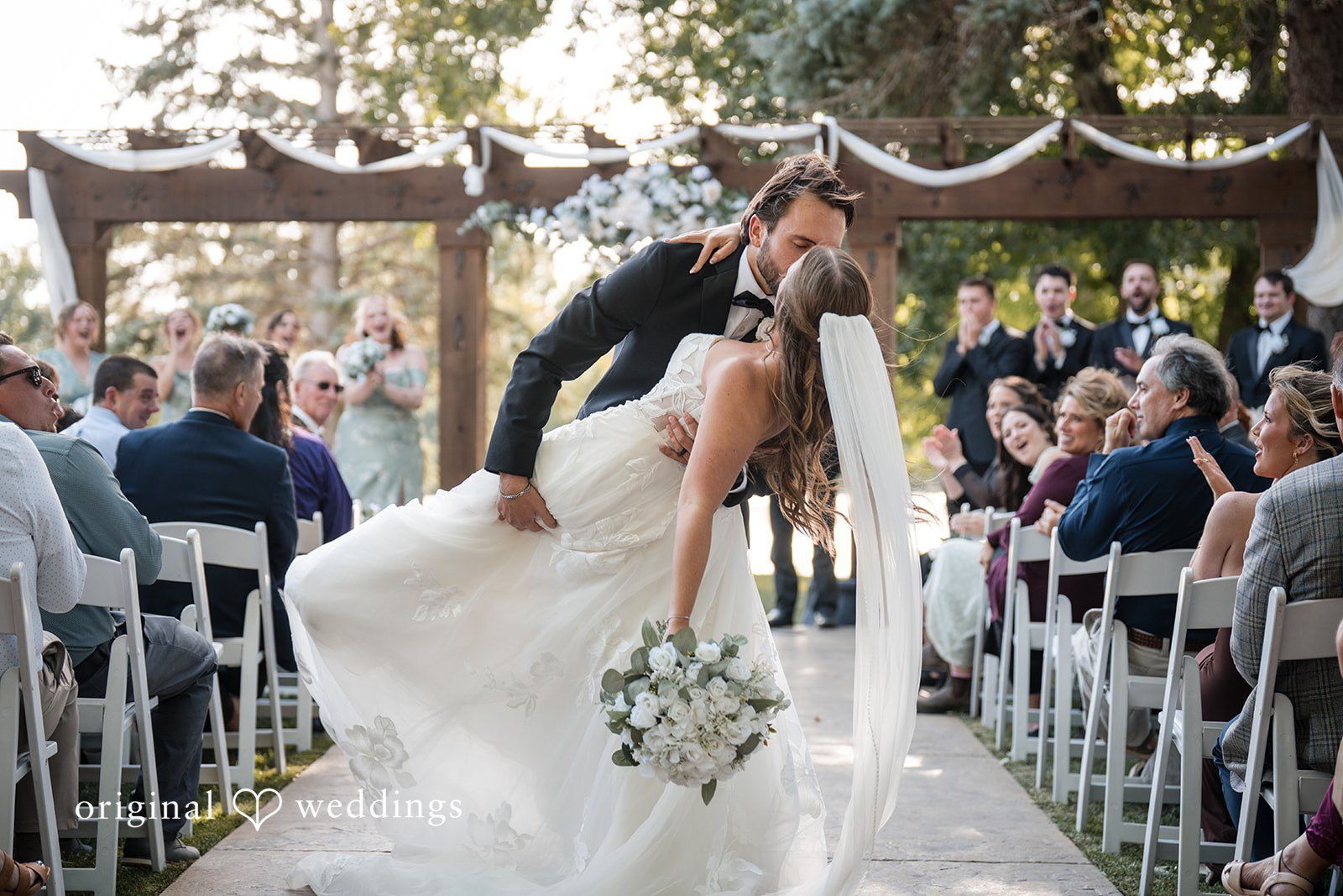Couple walking up the aisle