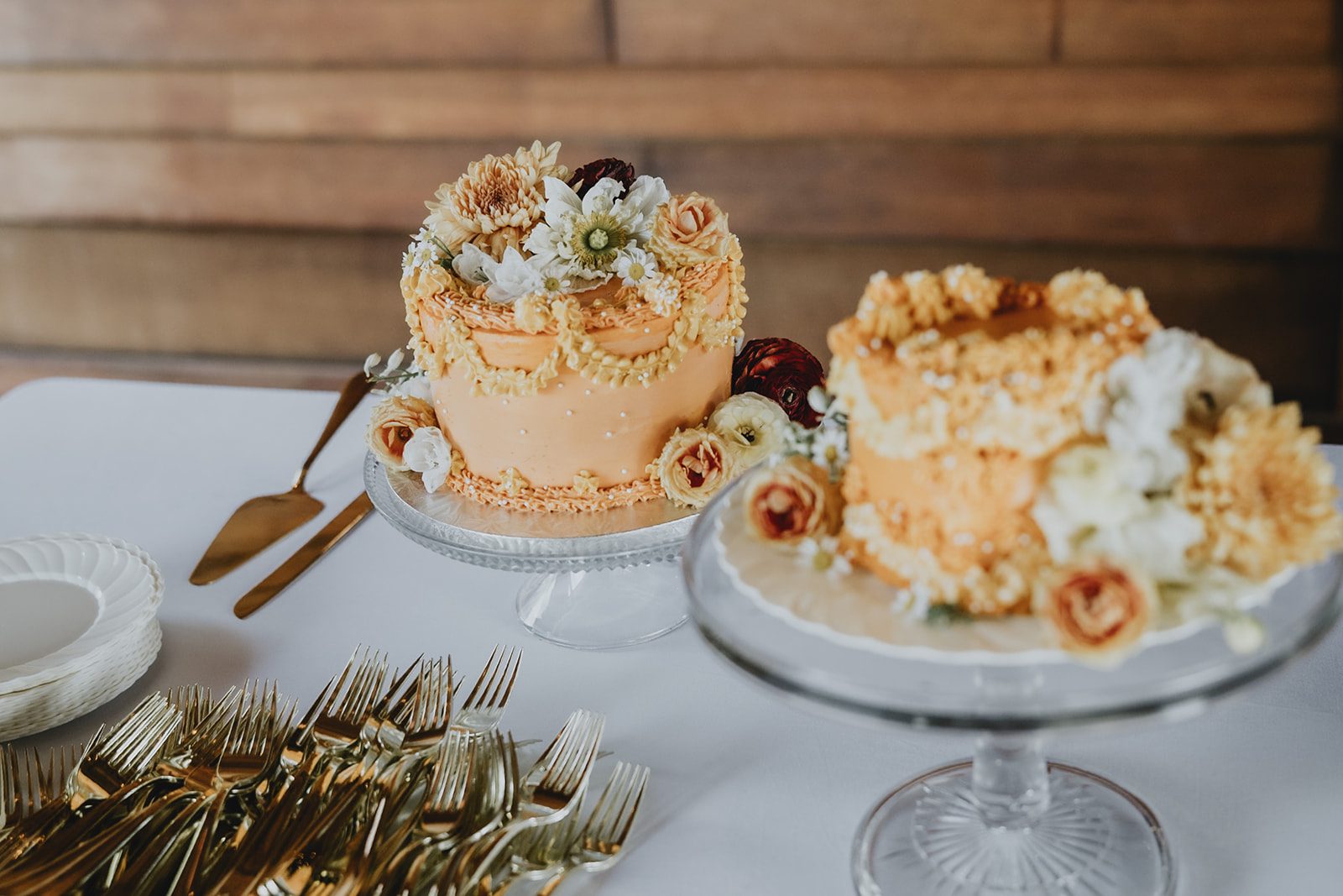 Orange floral wedding cakes