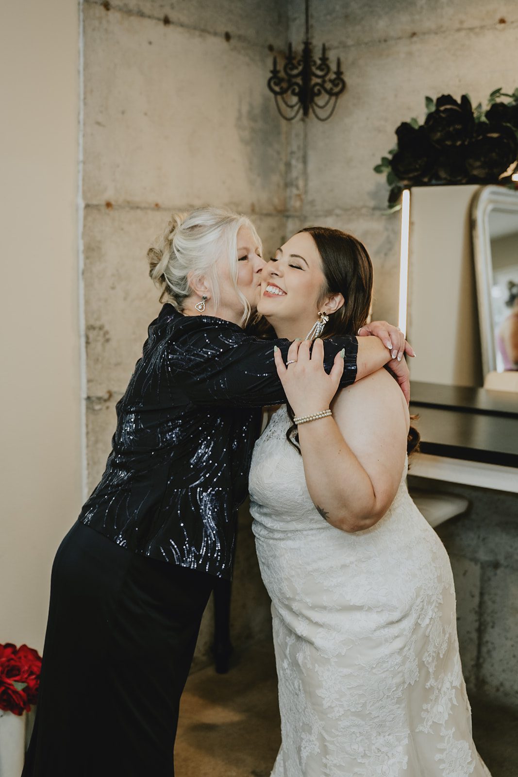Bride getting ready with a friend