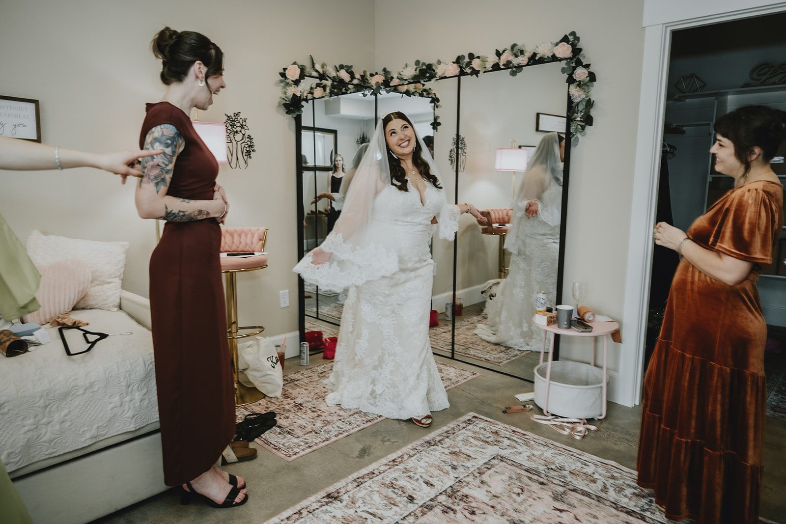 Bride with bridesmaids in burnt orange at Brightwater Weddings & Events