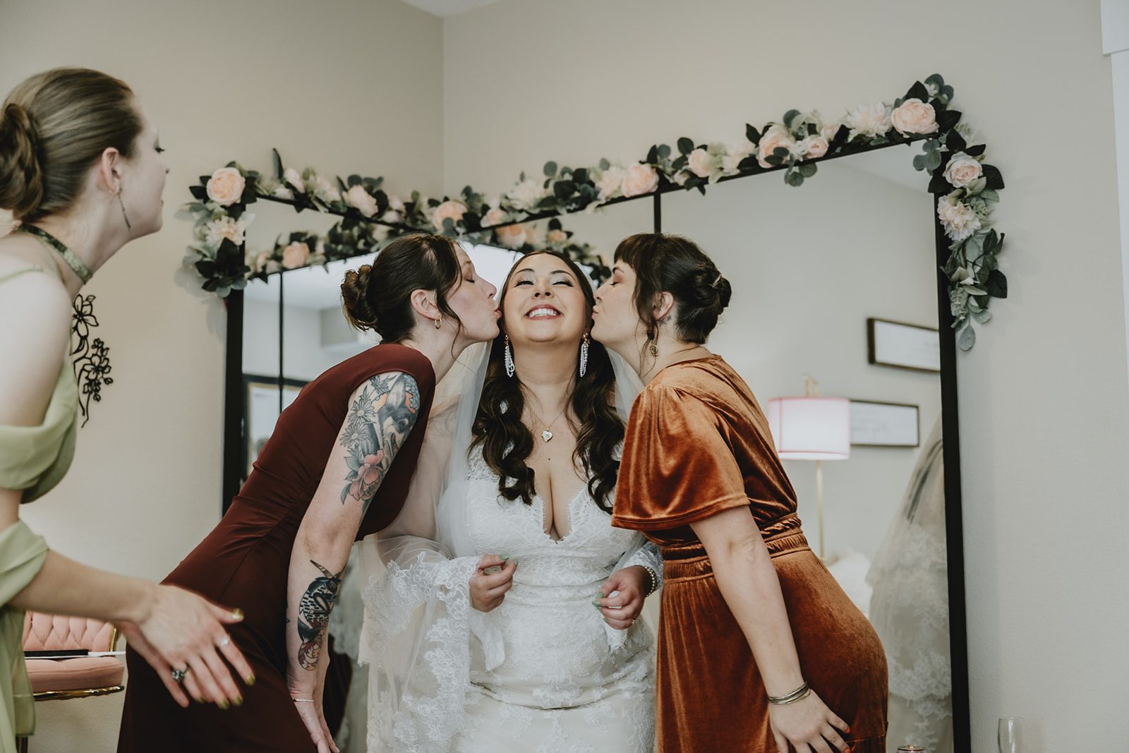 Bridesmaids gathered around the bride