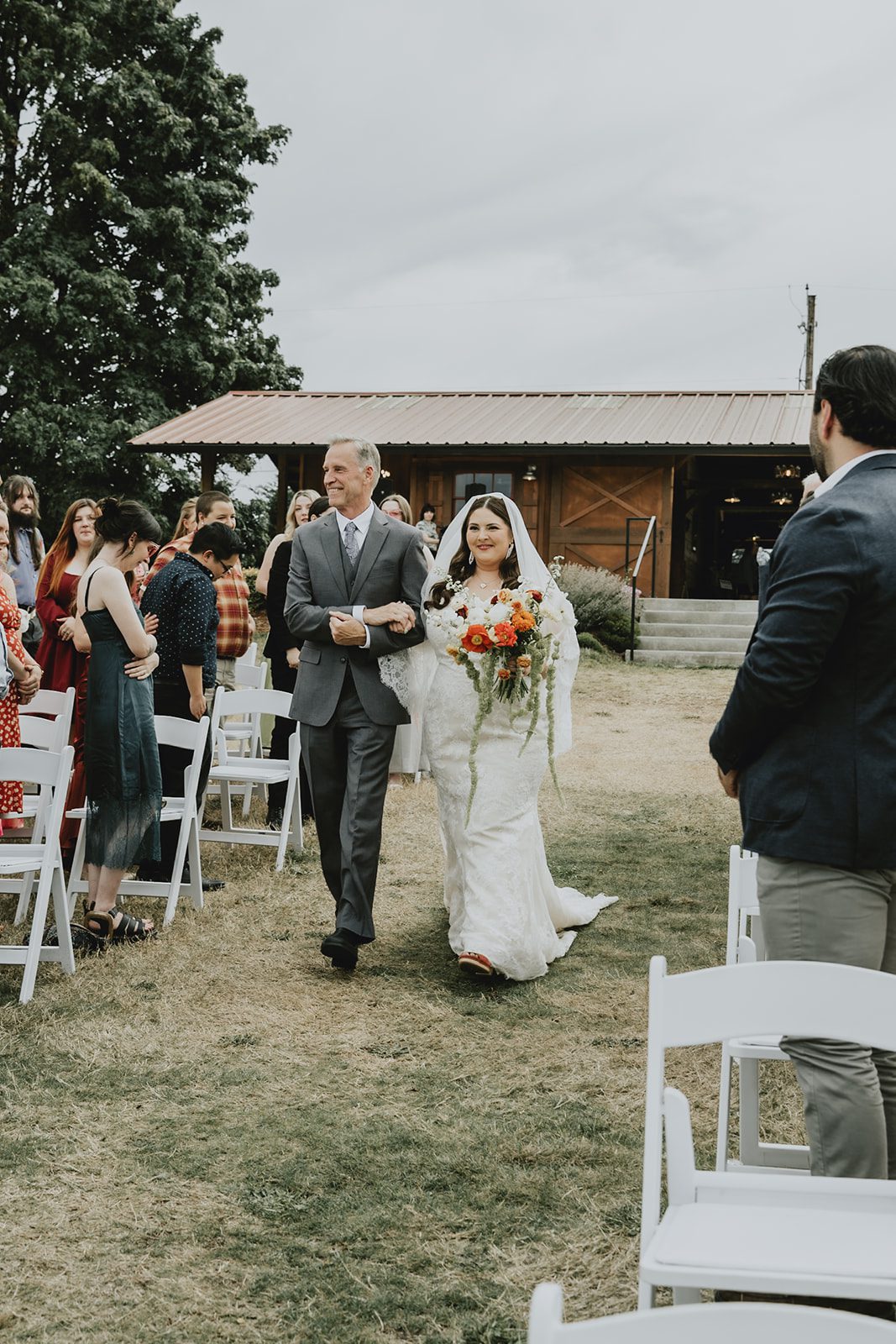 Wedding party walking down the aisle