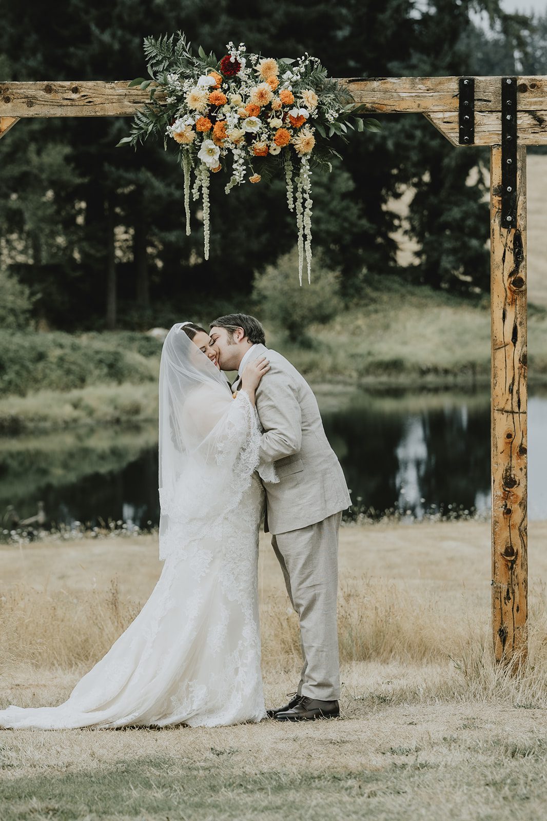 Couple at the altar by the lake